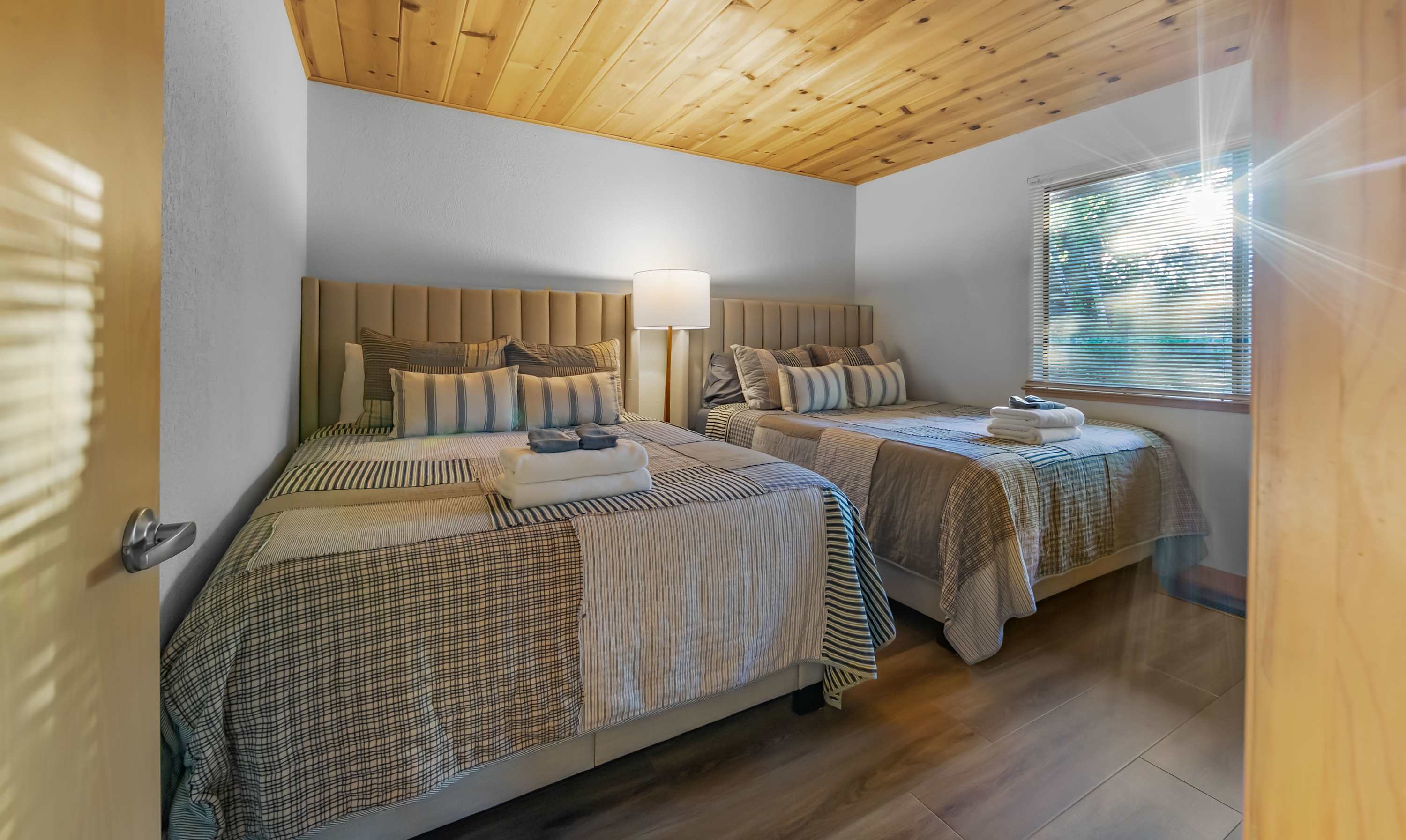Flexible sleeping arrangements make this second bedroom ideal for families or groups