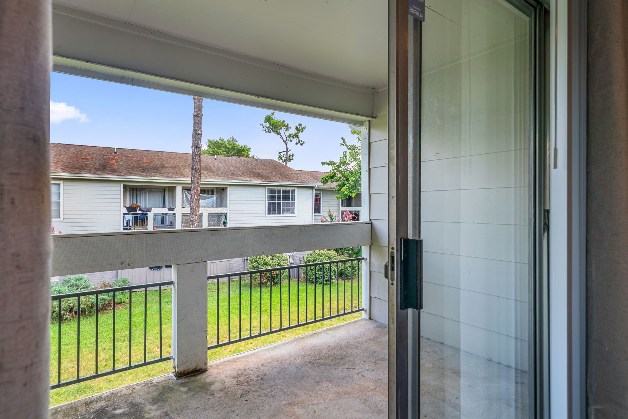 Enjoy a peaceful morning coffee on your private balcony with serene views of the greenery.