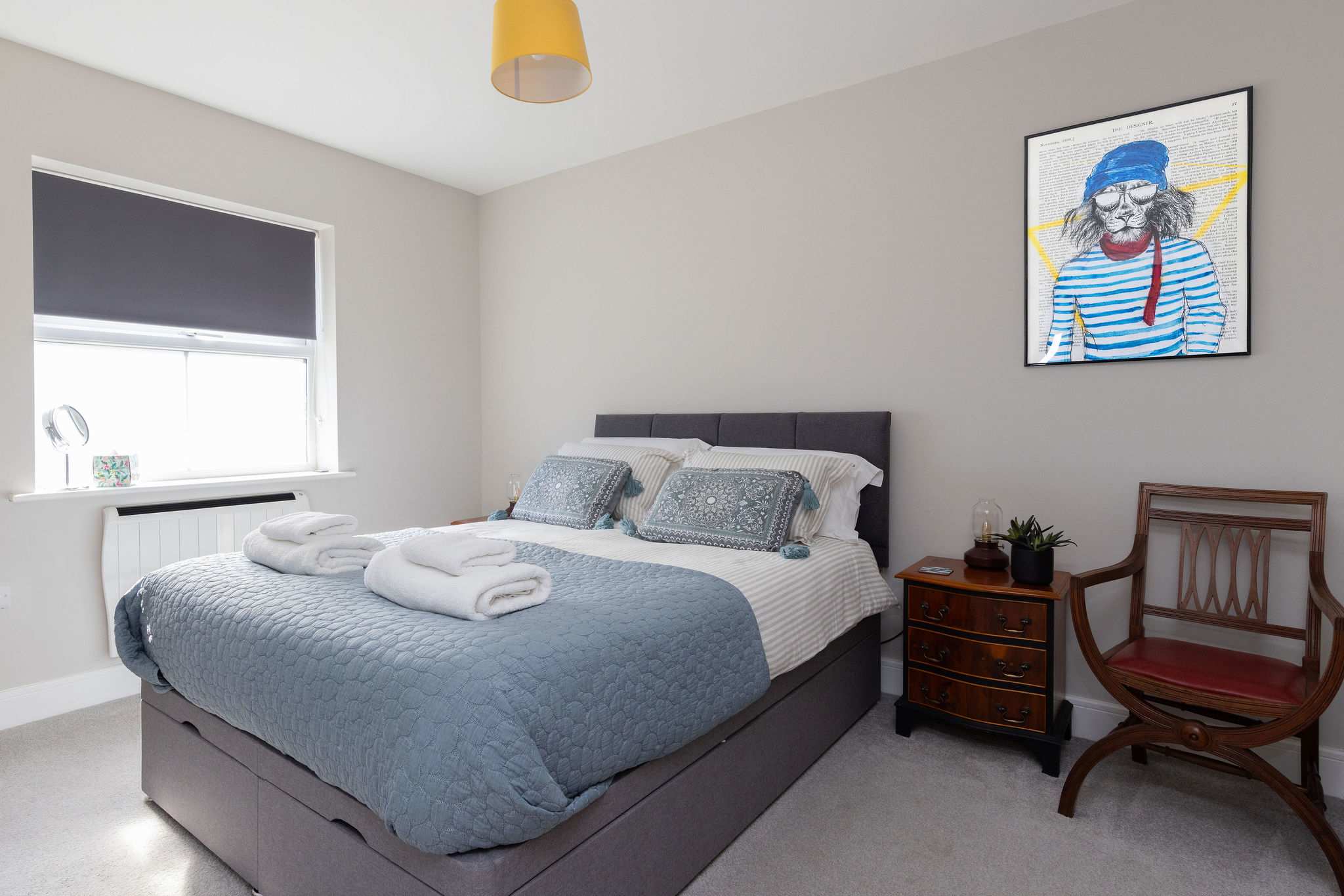 Bright king bedroom with ensuite, offering a comfortable and relaxing seaside getaway