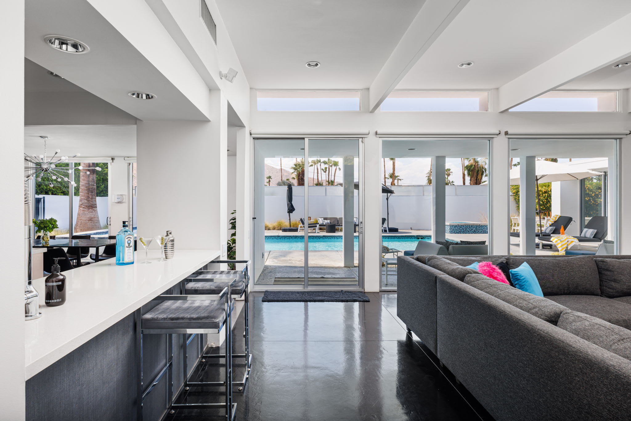 Living Room/Kitchen | The Bond House in Palm Springs, California by Luxus Vacation Properties