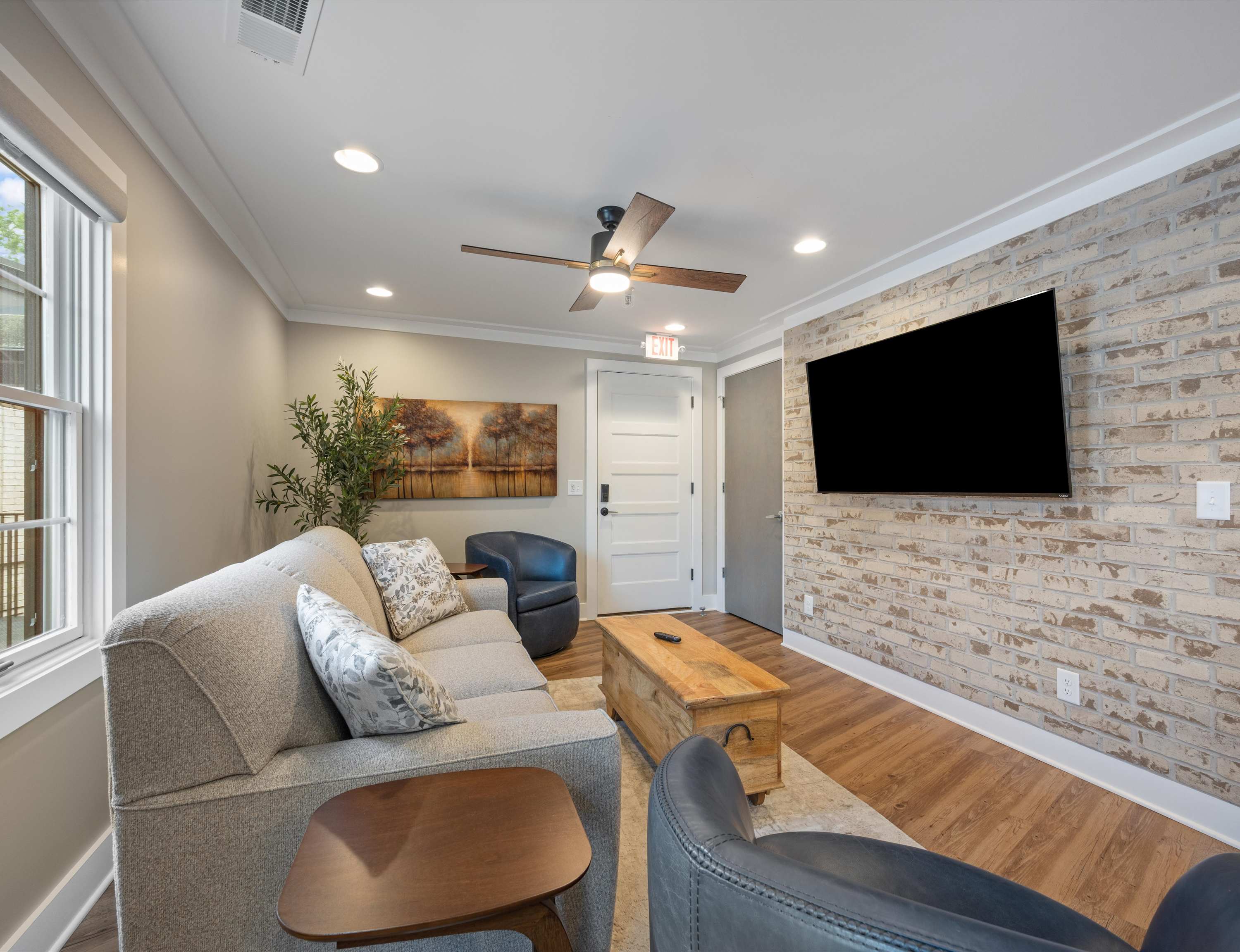 Stream your favorites on the smart TV in Suite C-22’s serene living room​​