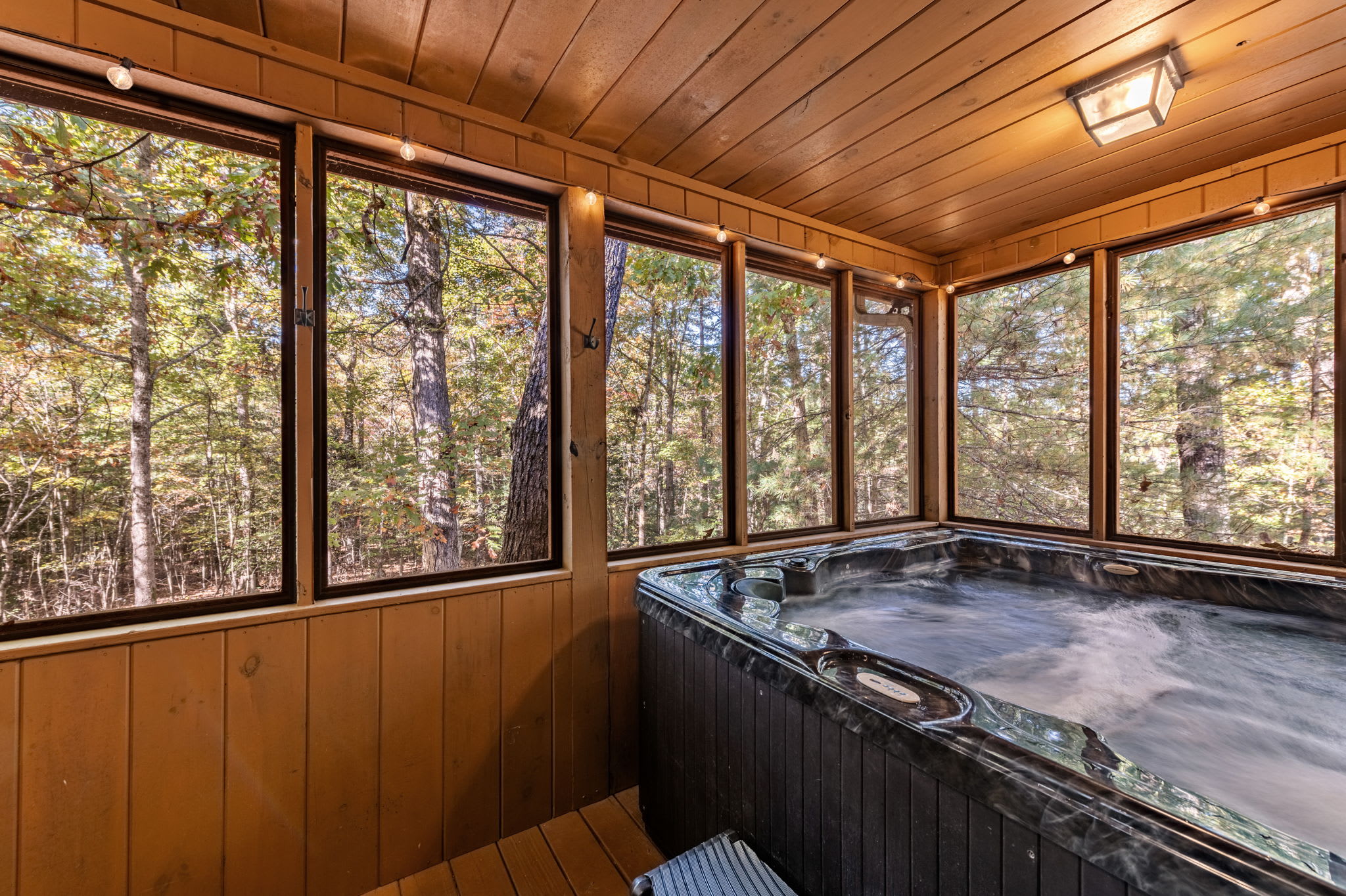 Bask in bubbling bliss in the private hot tub​