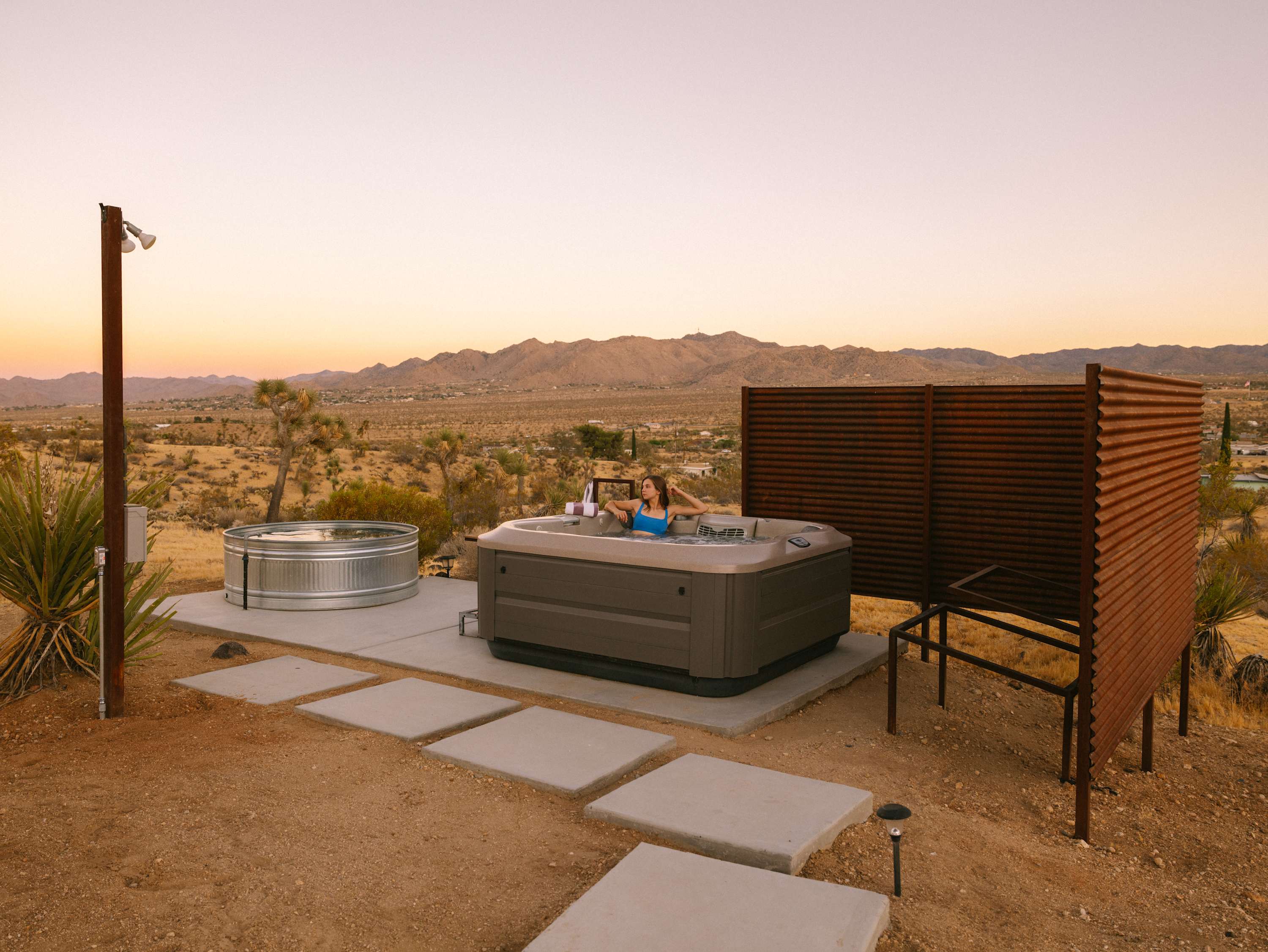 Hot tub & Cowboy tub area with brand new privacy fence 