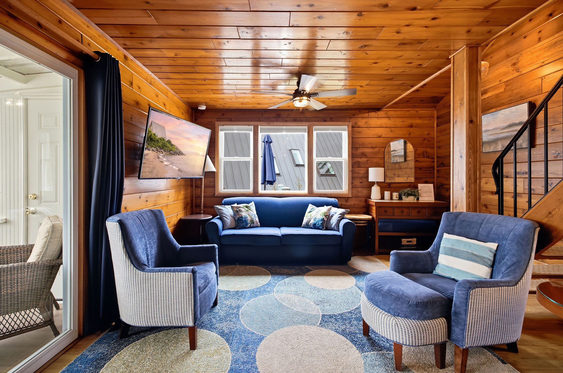 Bright gathering space with Smart TV and seating for the whole family.