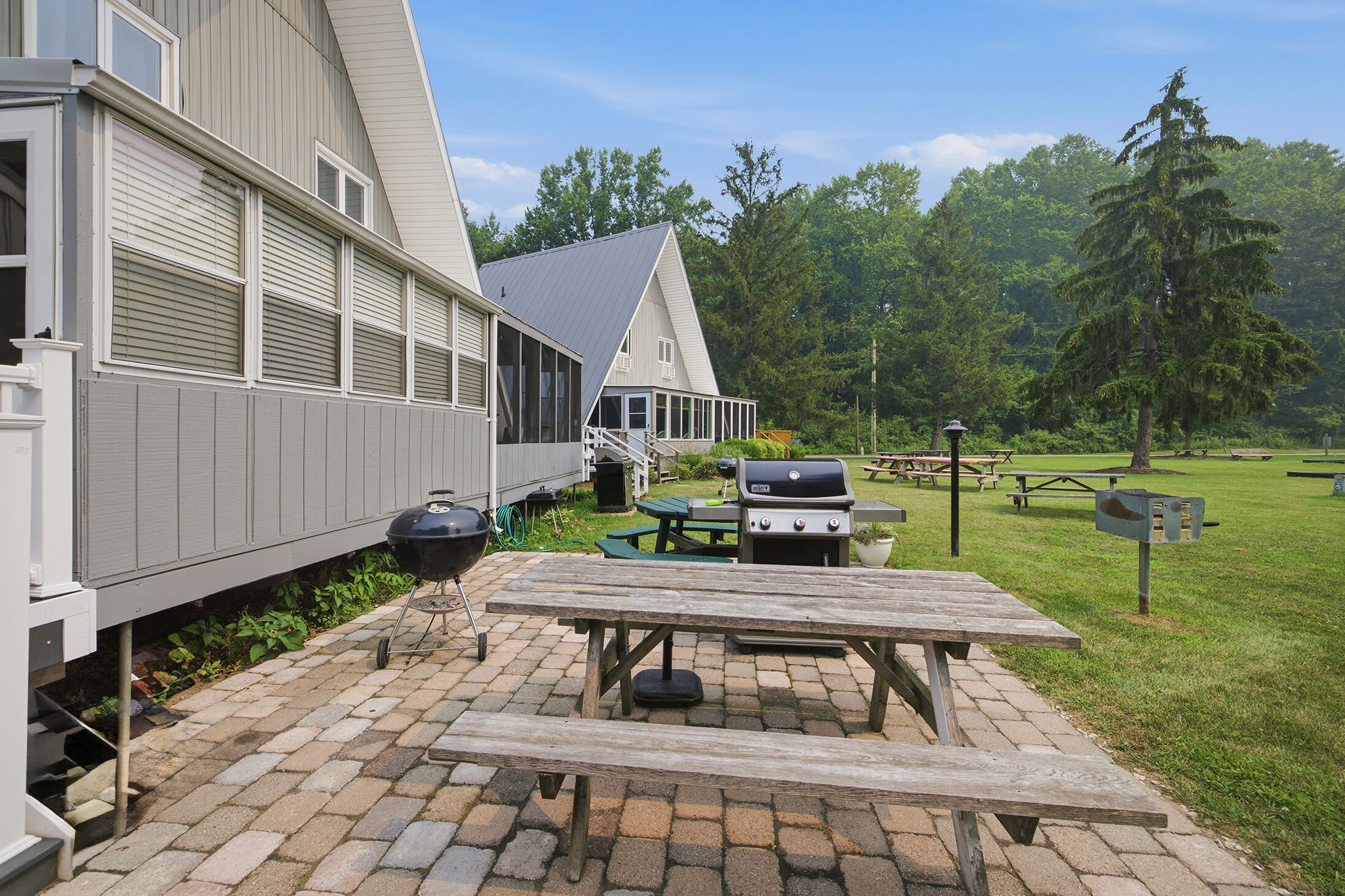 Outdoor patio with grilling area for relaxed vacation dinners.