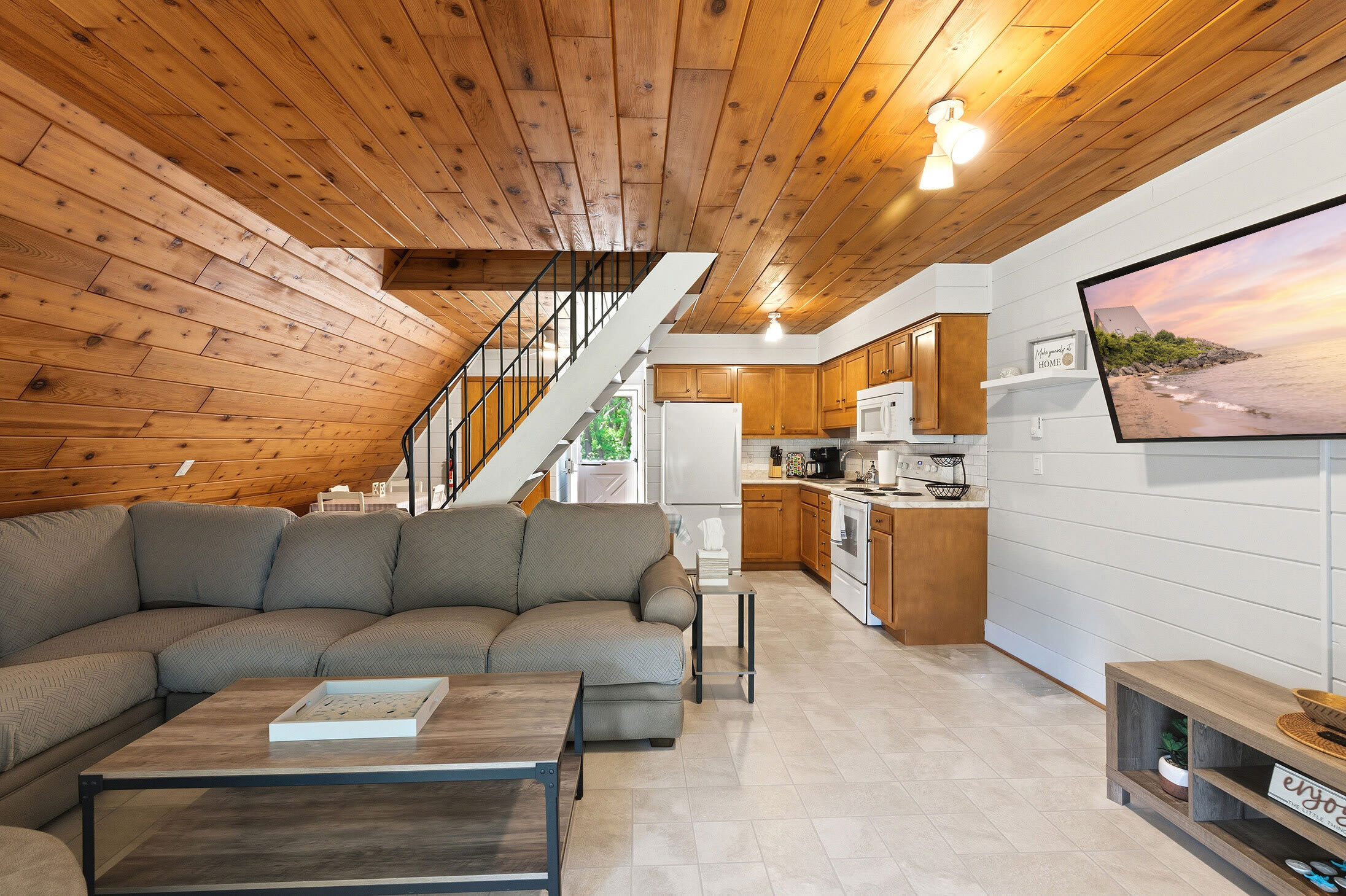 Open living and kitchen area, everything on one floor with easy flow between spaces.