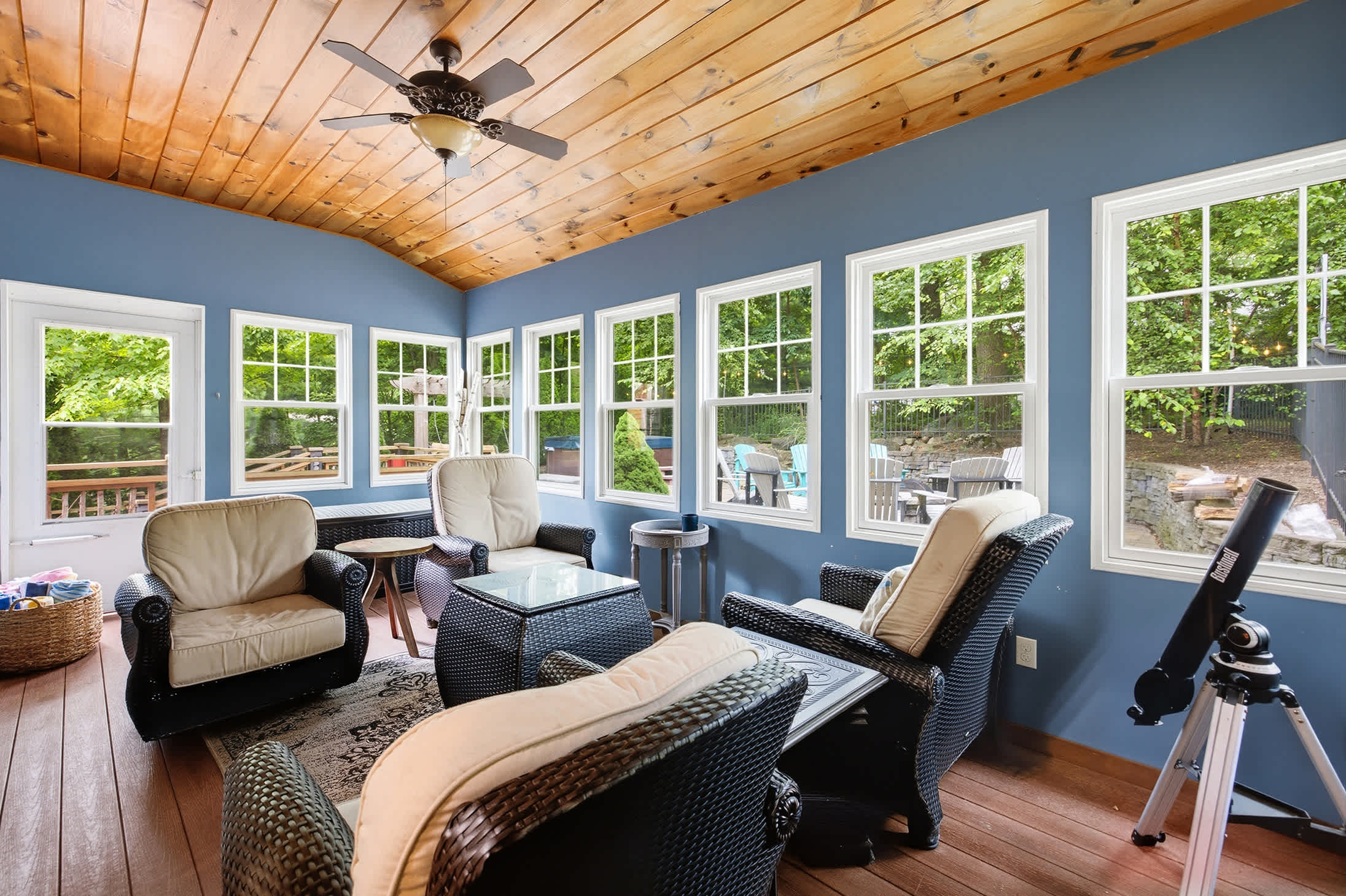The three-season room is a wonderful spot to take morning coffee.