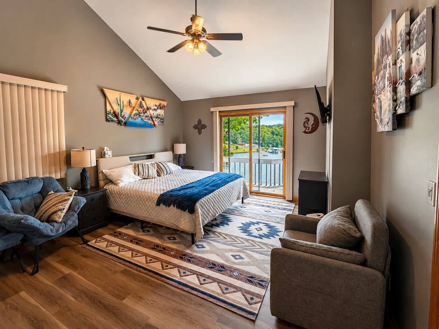 The primary king suite boasts a private ensuite, smart TV & deck access​