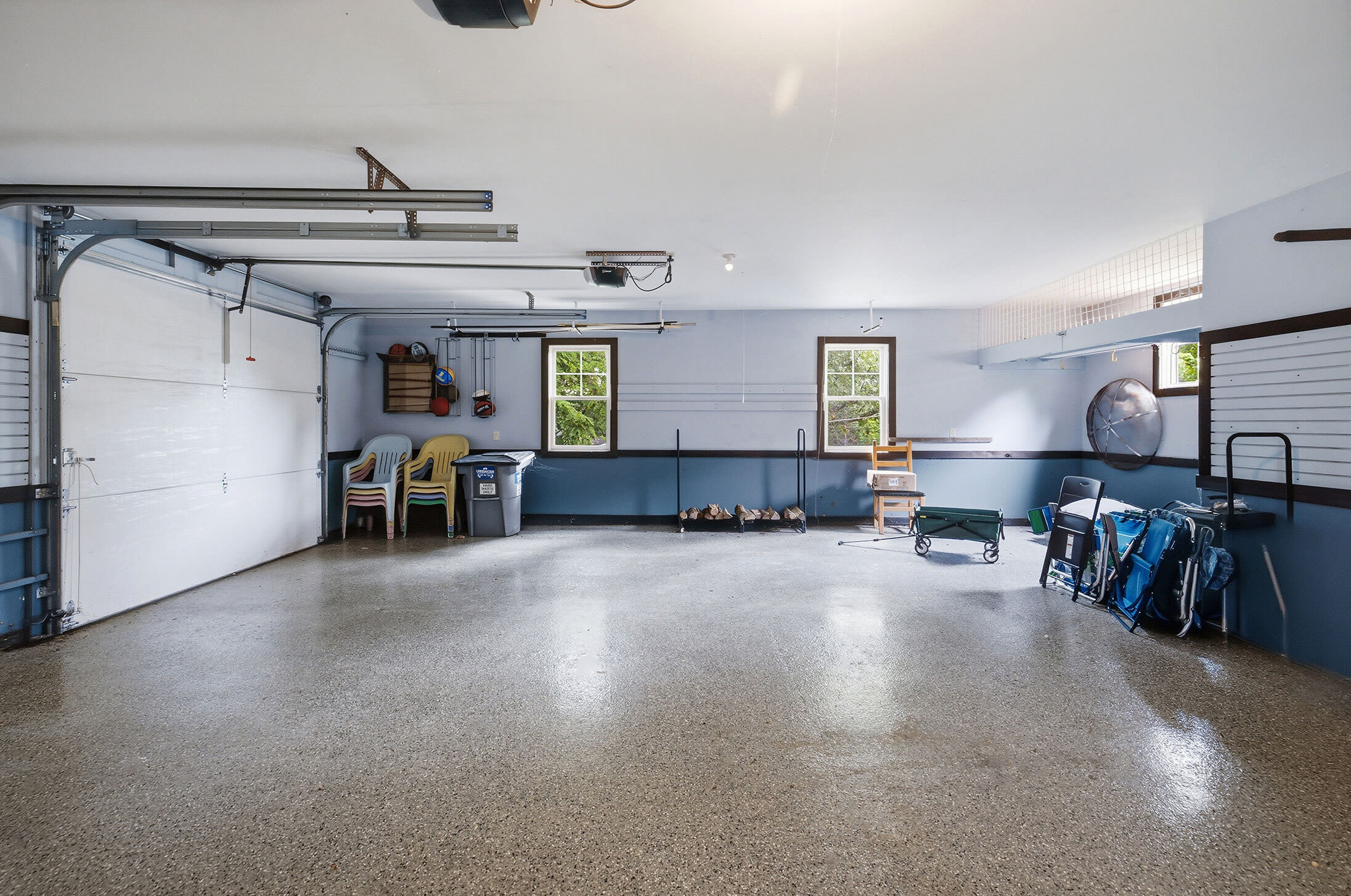 Garage storage keeps beach gear and outdoor equipment organized.