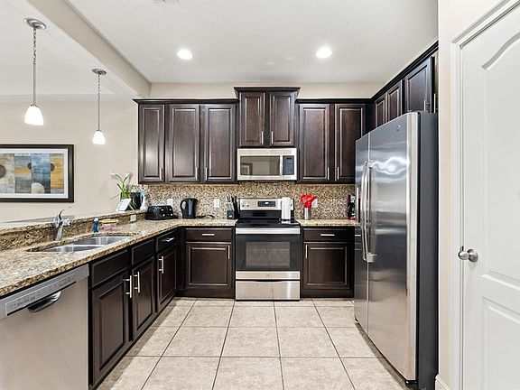 3BR Townhome, 12 Mi to Disney | Resort Pool + Grill