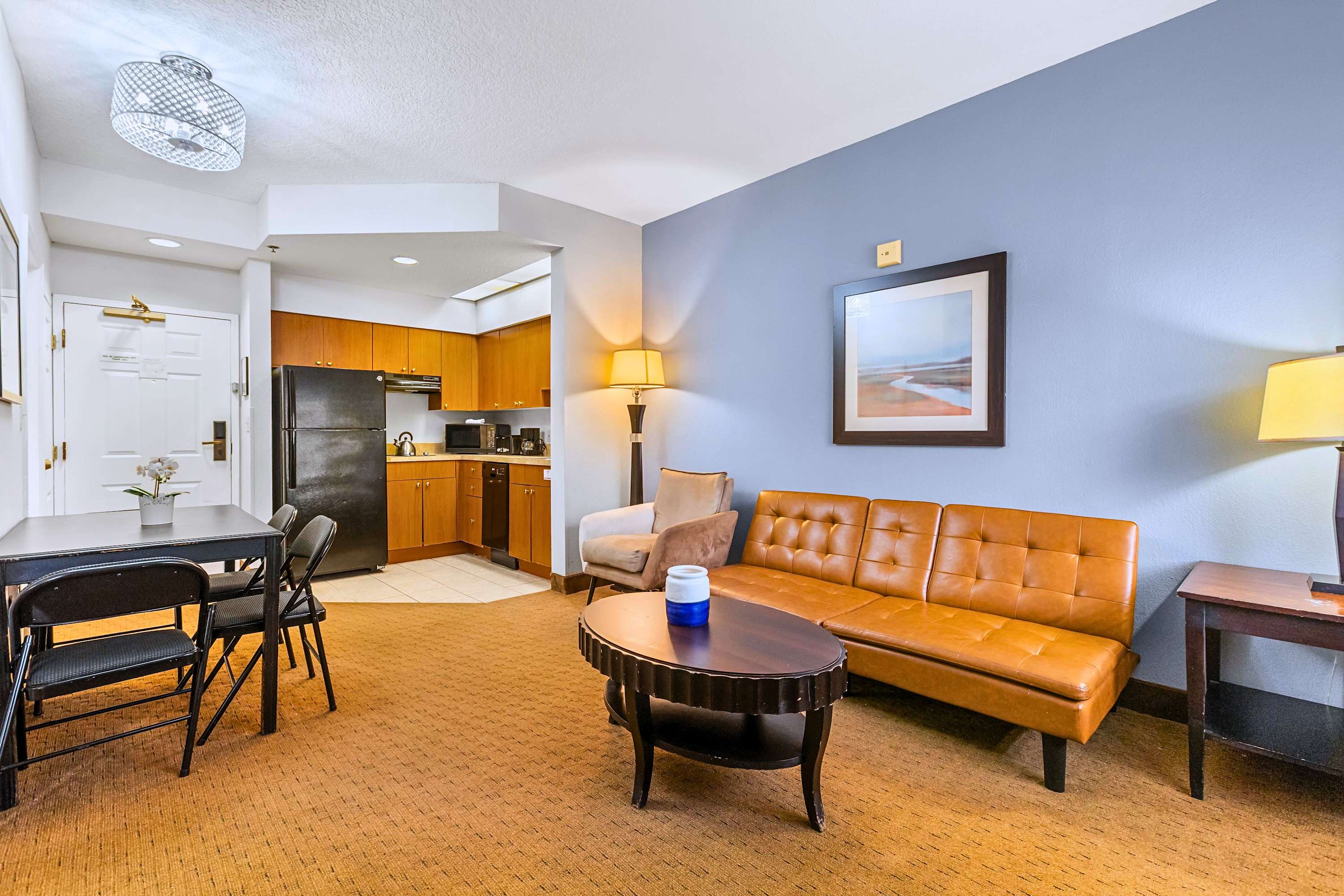 Whip up a meal, share a bite, and kick back on the couch! Perfect group setup.
