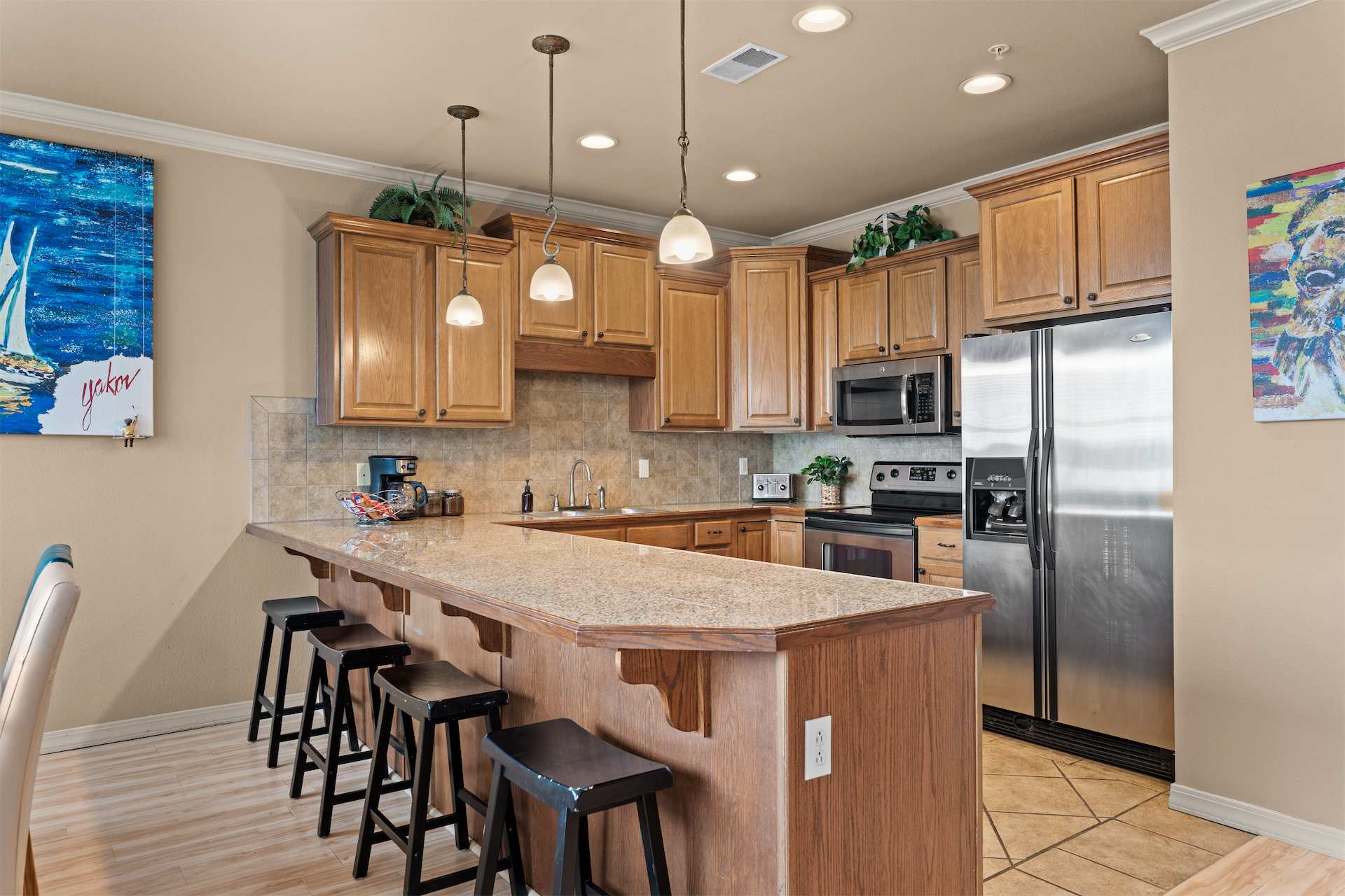 The open kitchen is well equipped for an unforgettable getaway​