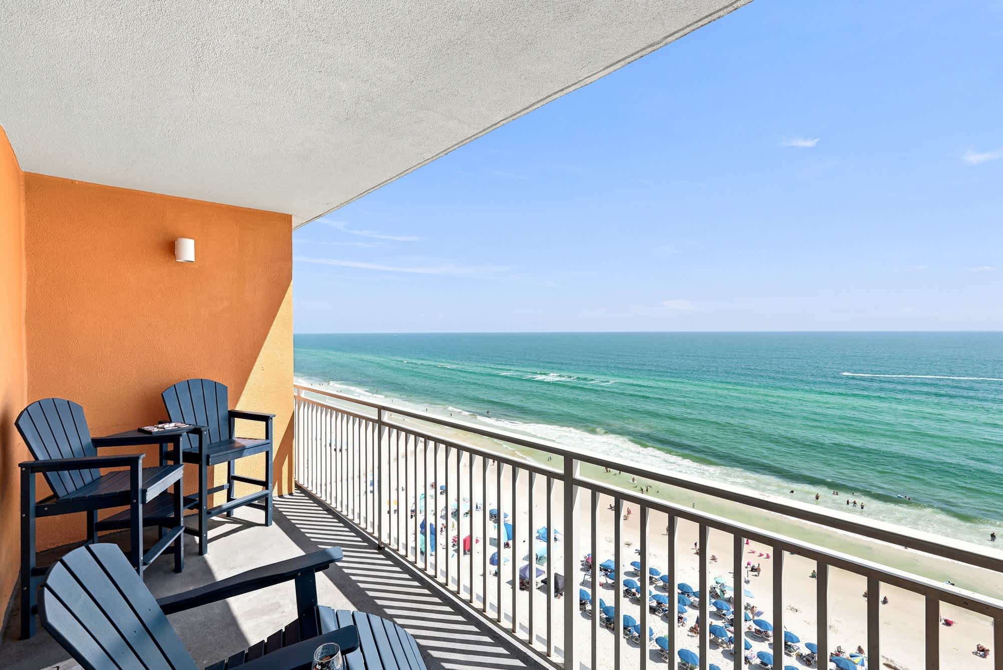 Splash 804E – Balcony with two chairs overlooking the beach and ocean view.