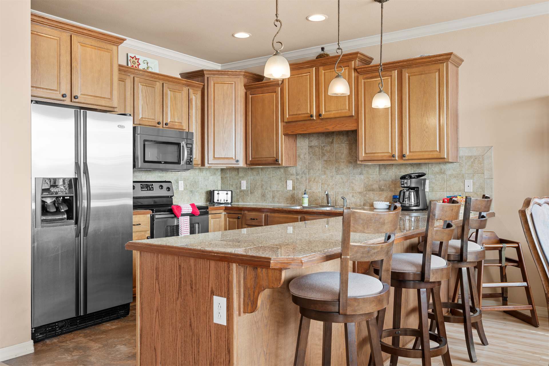 The open kitchen is well equipped for an unforgettable getaway​