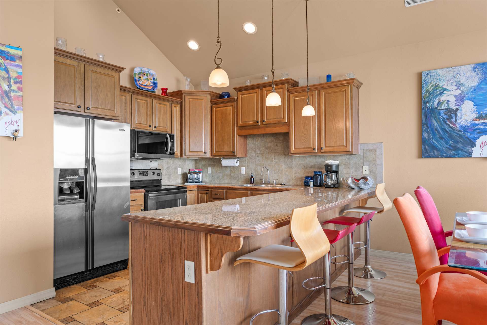 The open kitchen offers ample space & all the comforts of home​