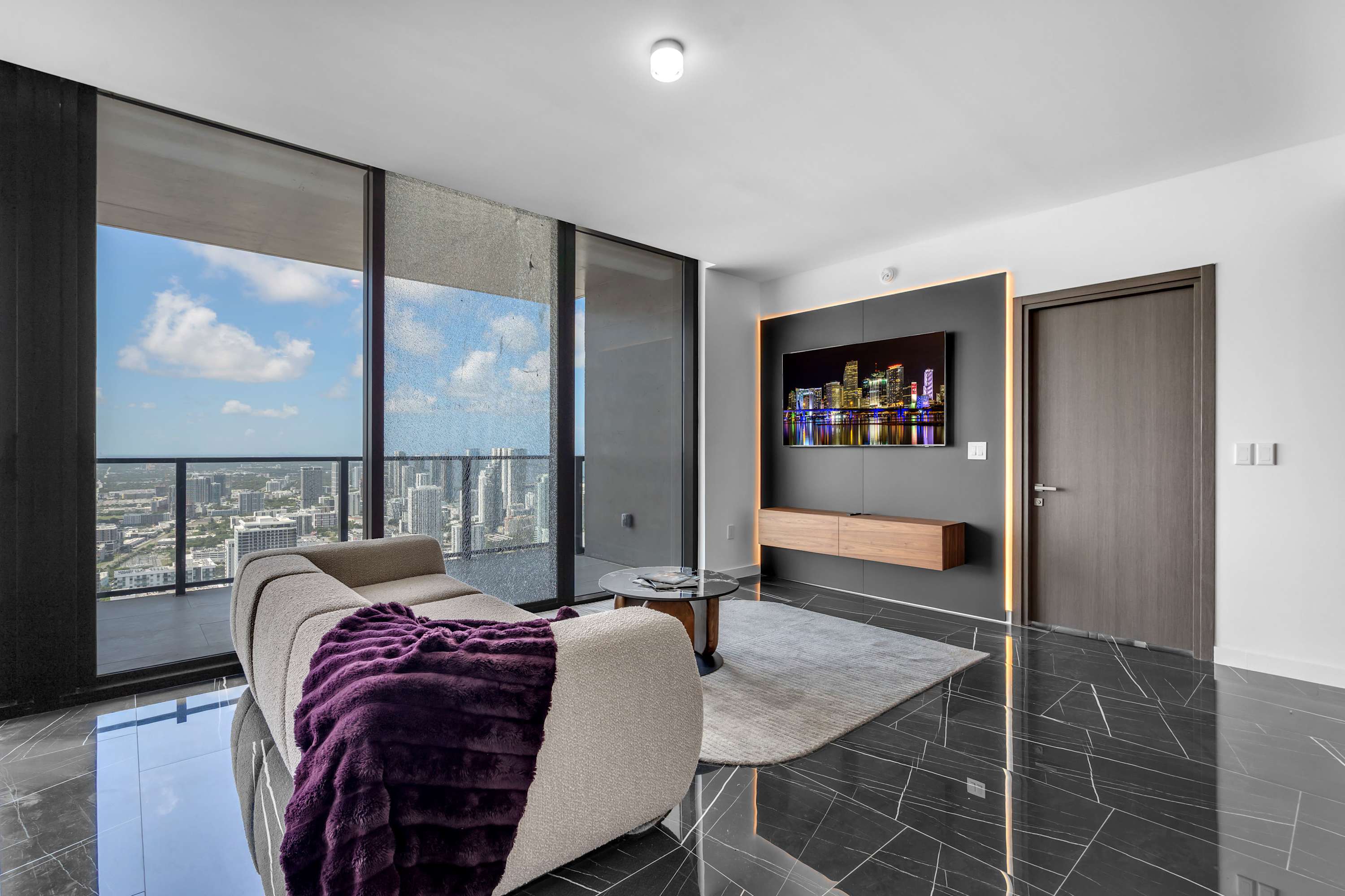 Unwind in the spacious living area & stream your favorites on the smart TV​