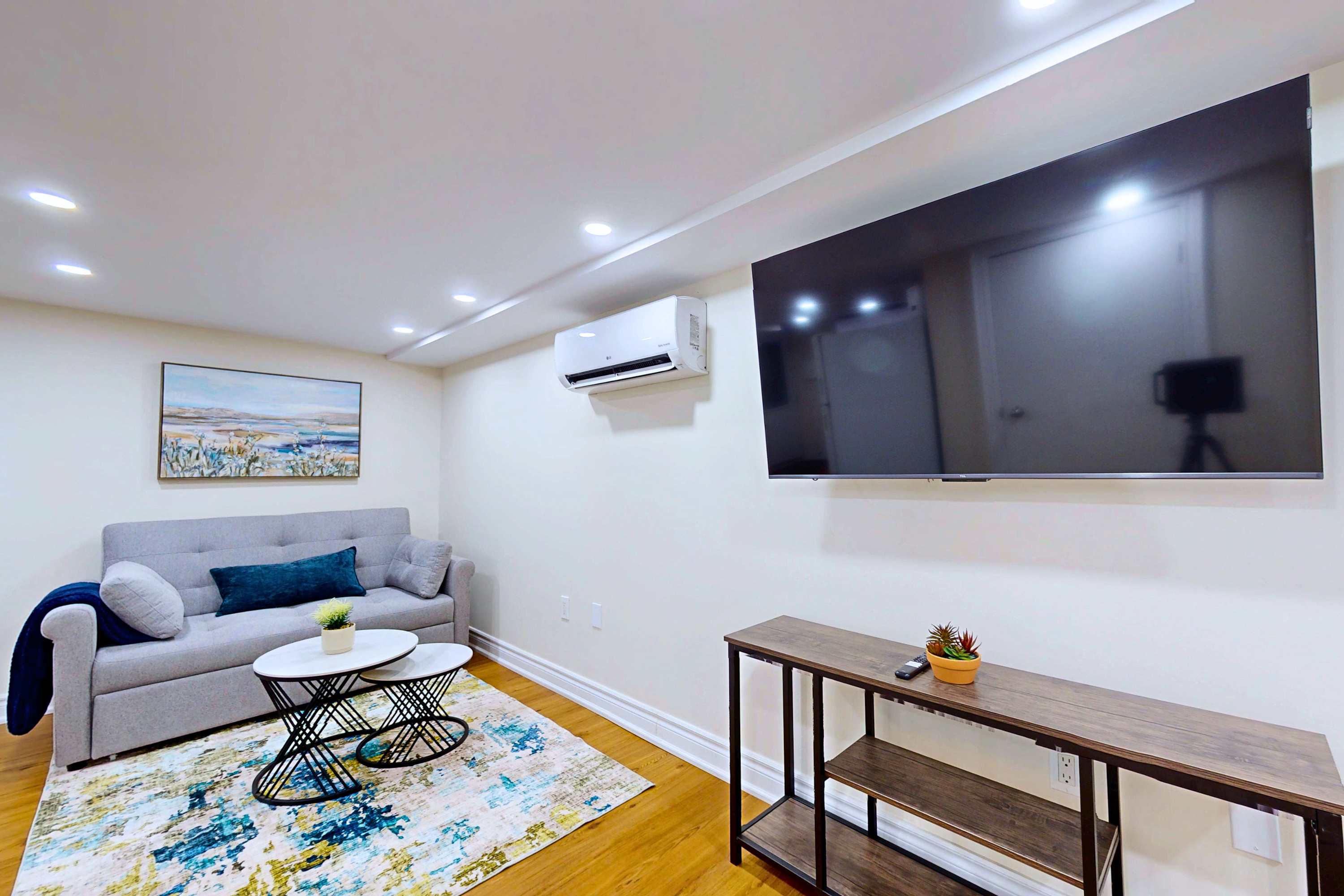 Living Area with Large Wall-Mounted TV