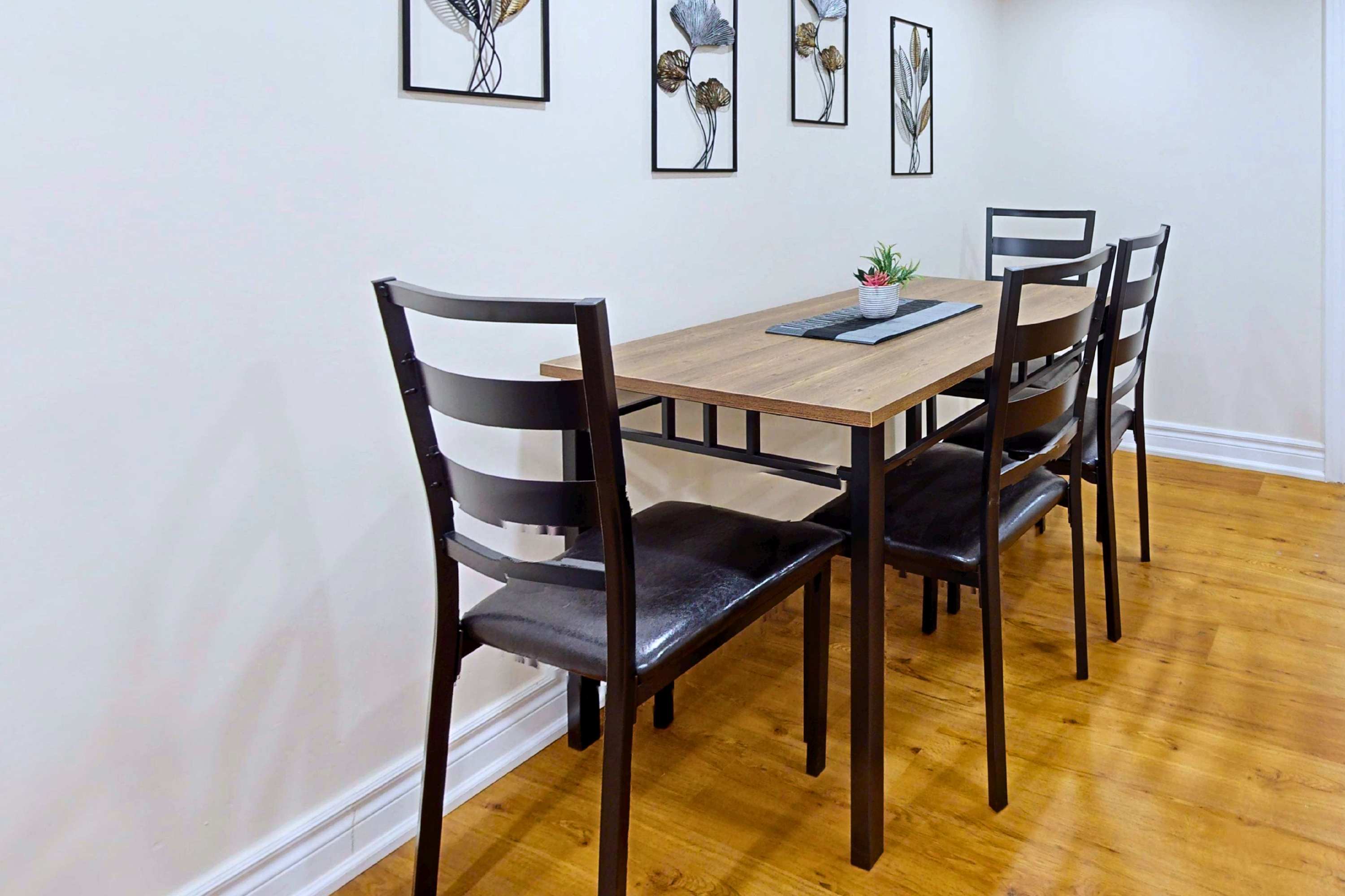 Cozy 4-person dining table set. Stylish, sturdy, and space-saving!