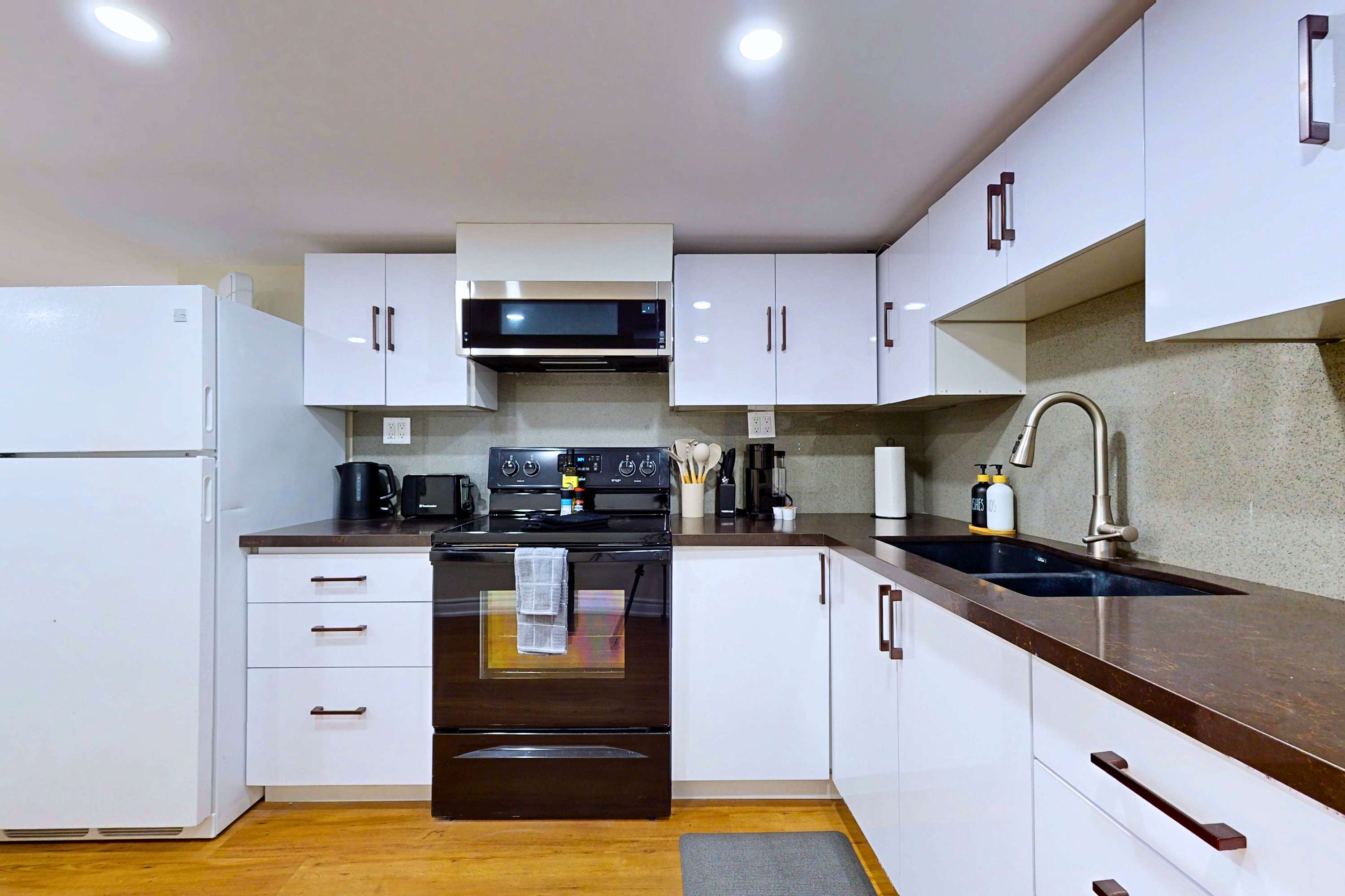 Modern kitchen stocked with all the essentials. Ready for any meal!