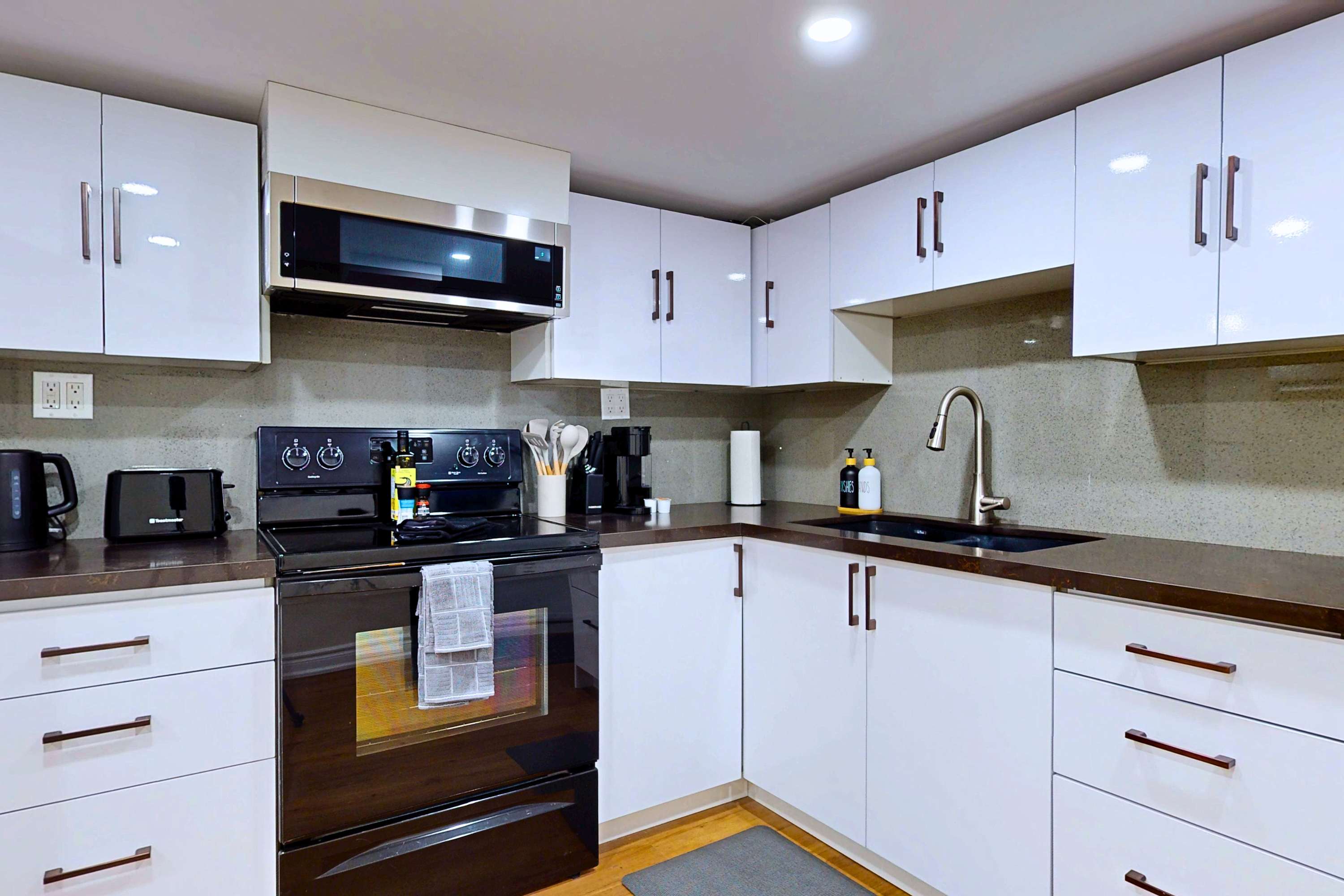 Kitchen area stocked with all the essentials for your daily meals.