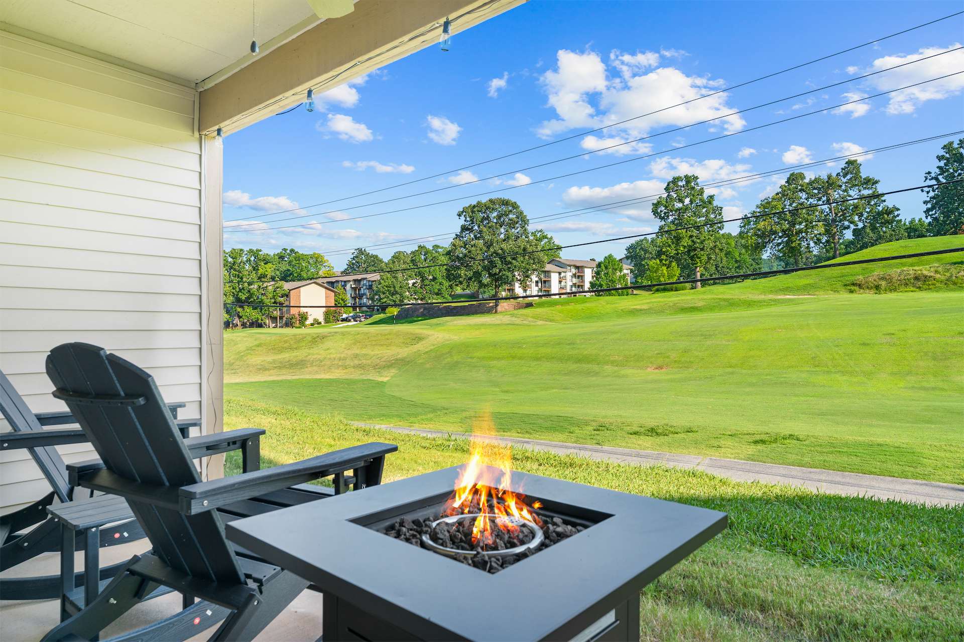 Sip morning coffee or an evening cocktail by the patio firepit​