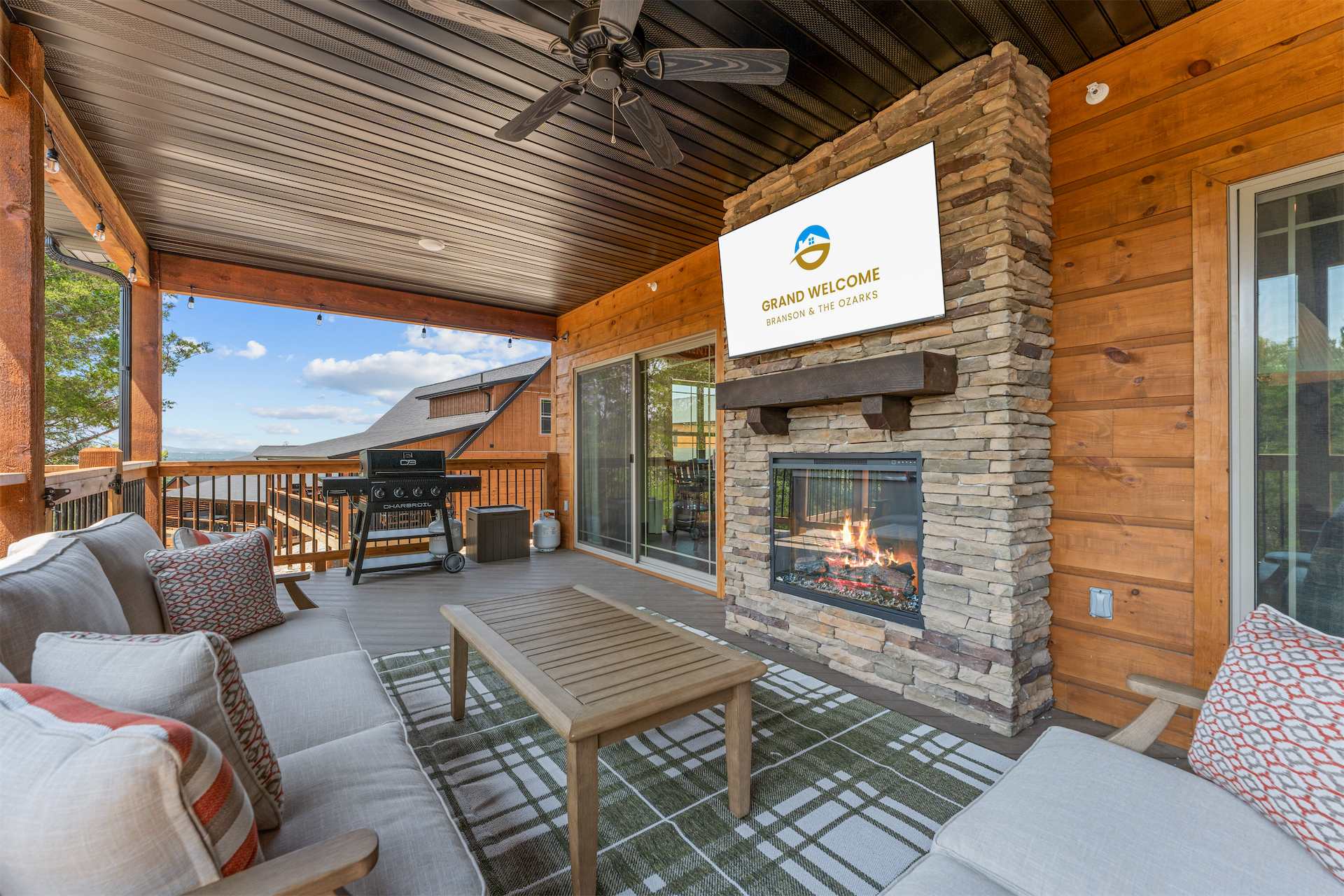 The back deck oasis is ideal for alfresco dining, relaxation, & play​
