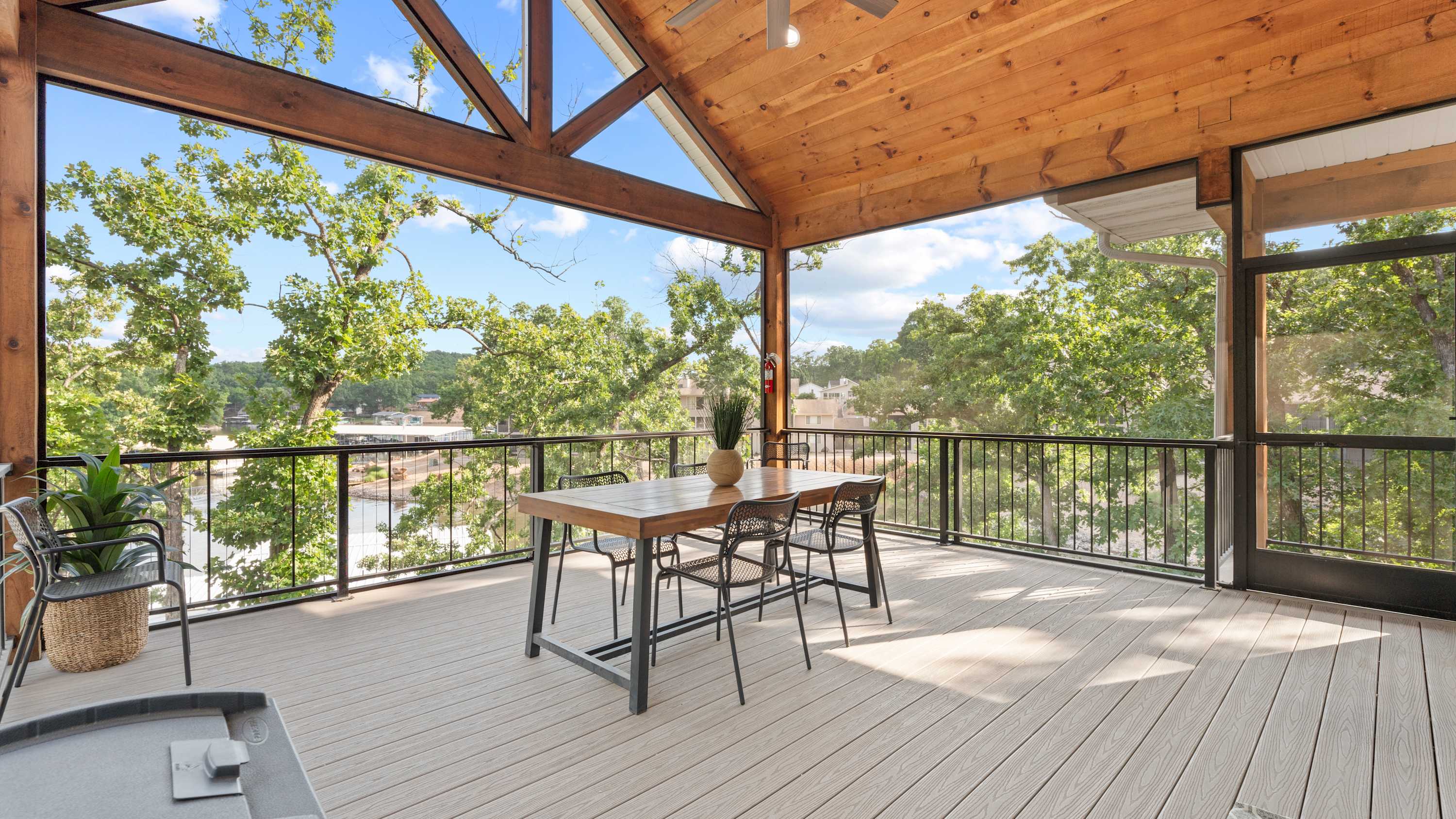 The screened deck is ideal for water-view dinners & game nights​