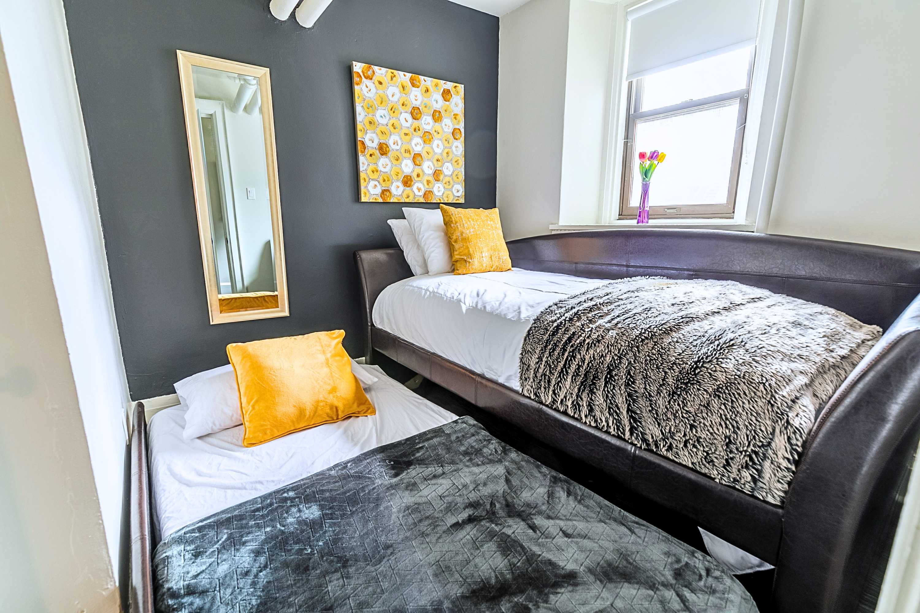 Pull-out bed setup providing flexible sleeping space