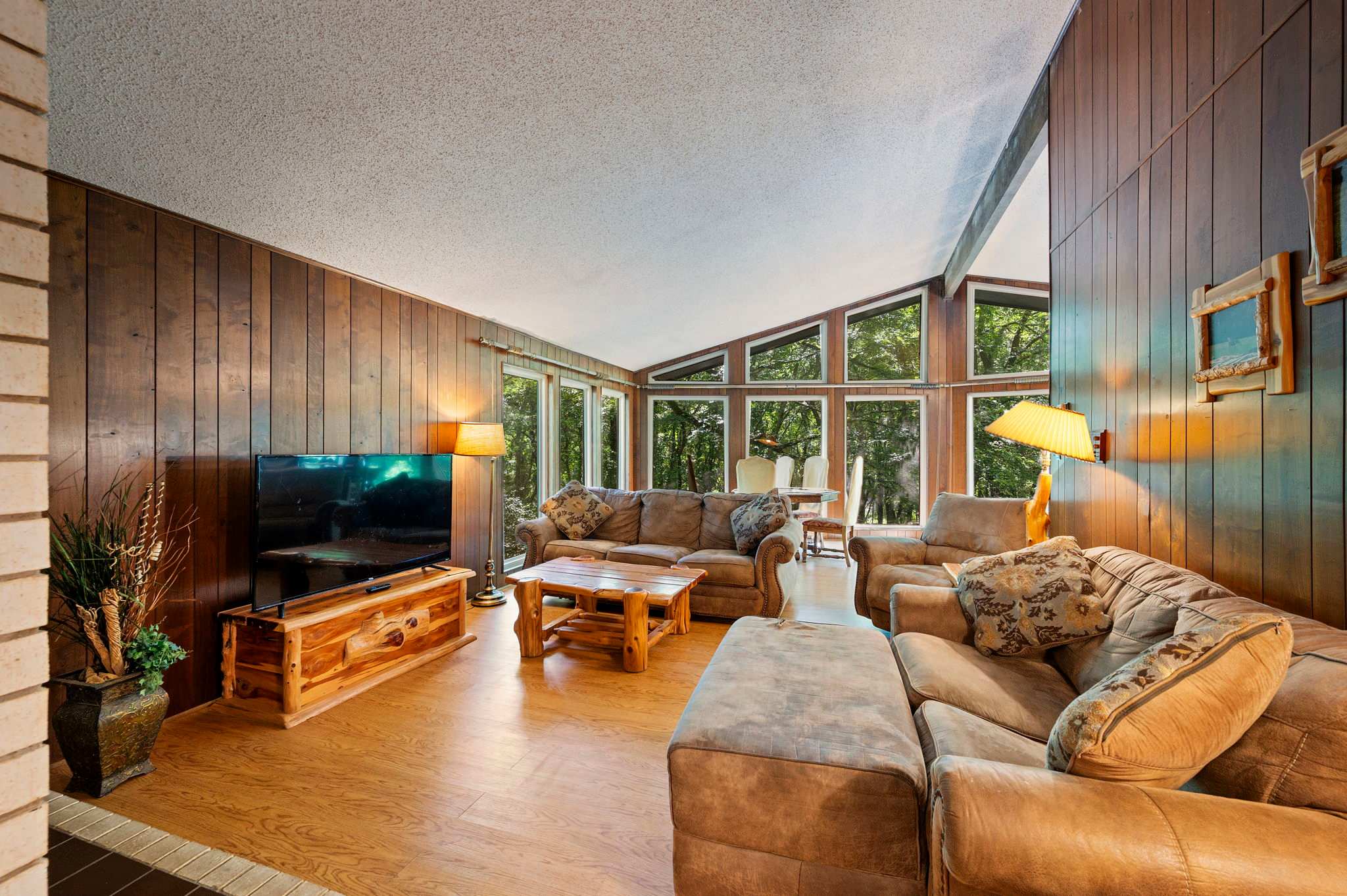 A retreat above the rest, tucked into the trees.
