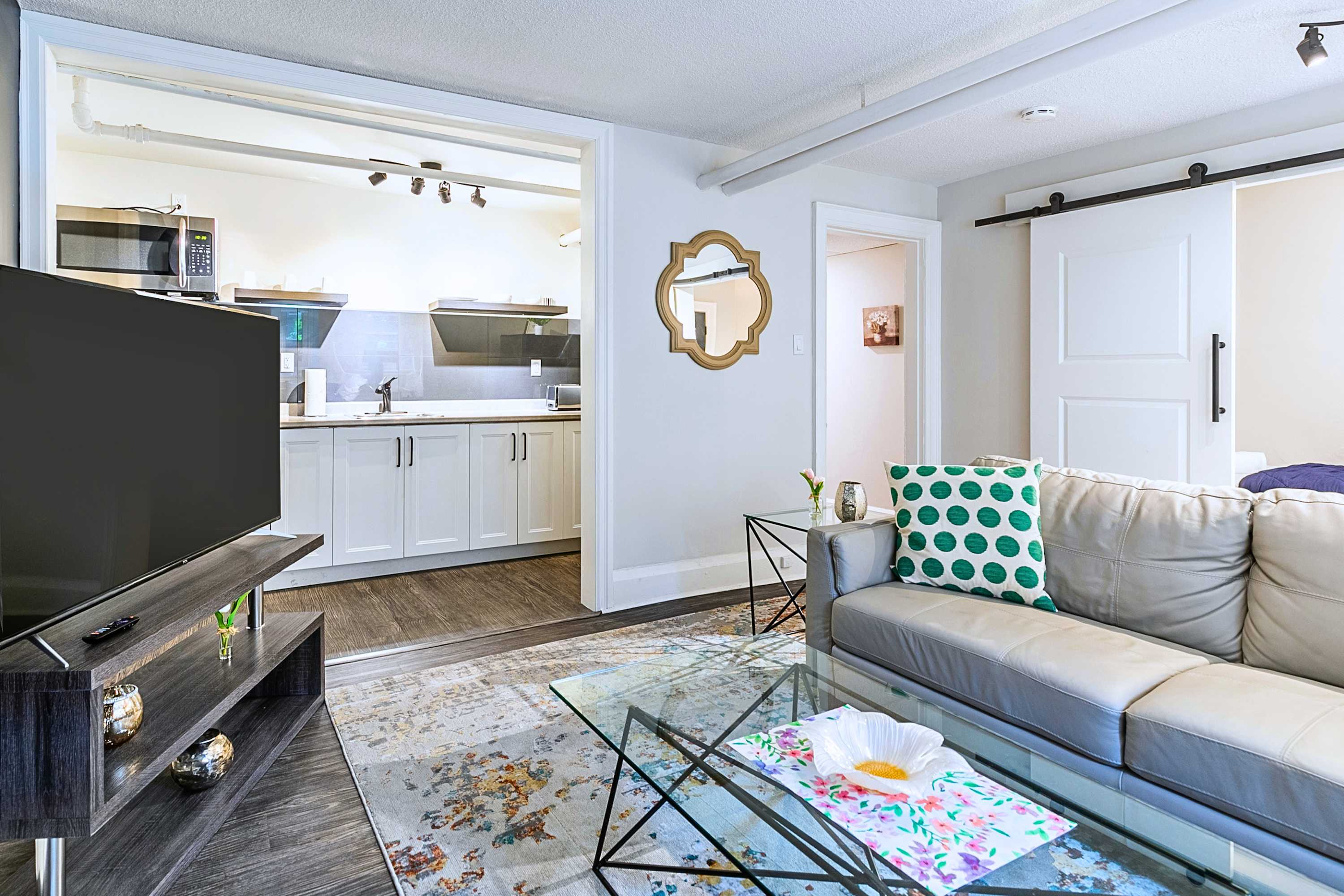 Chill Living Zone With TV & Open Kitchen