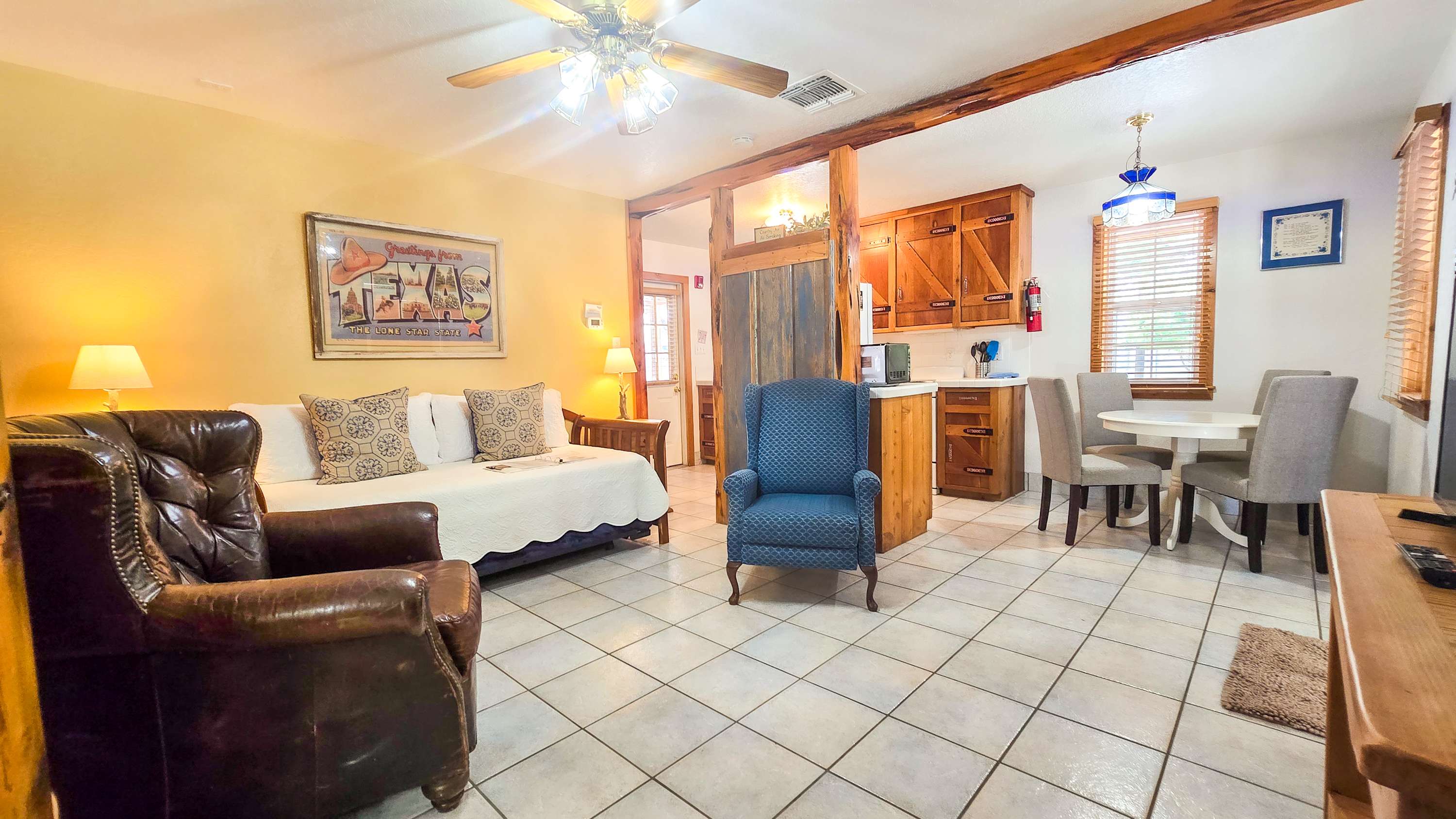 Recharge in the charming living room area & enjoy a movie night at home​