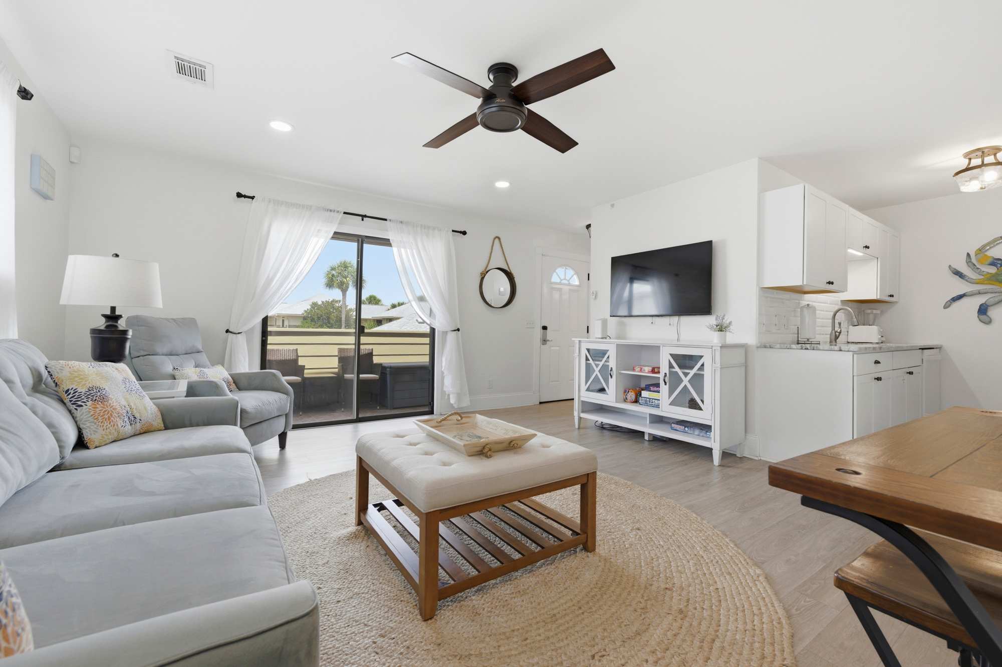 Unwind in the airy living room & stream your favorites on the smart TV​