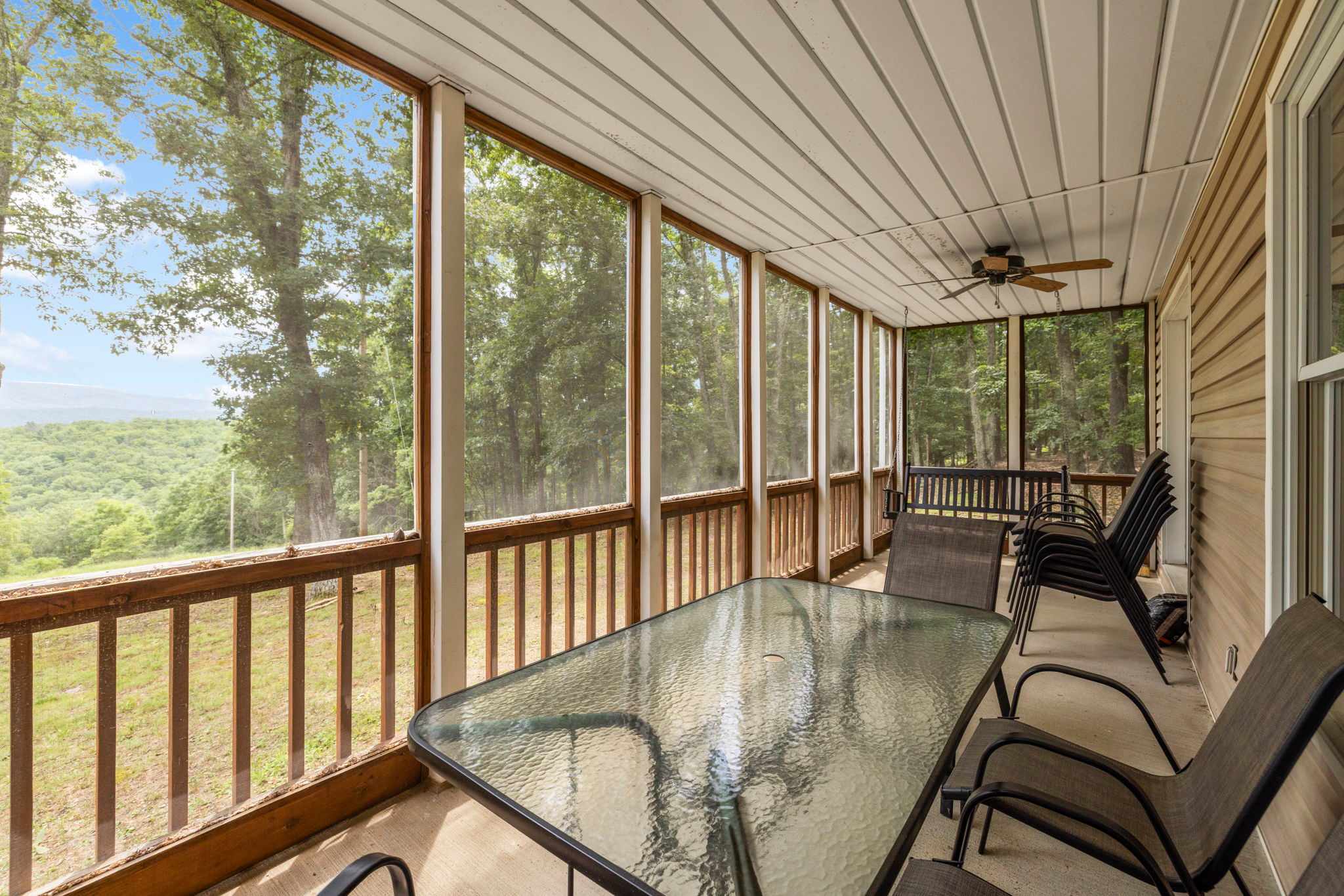 Upper & lower screened-in porches for relaxing in comfort, rain or shine