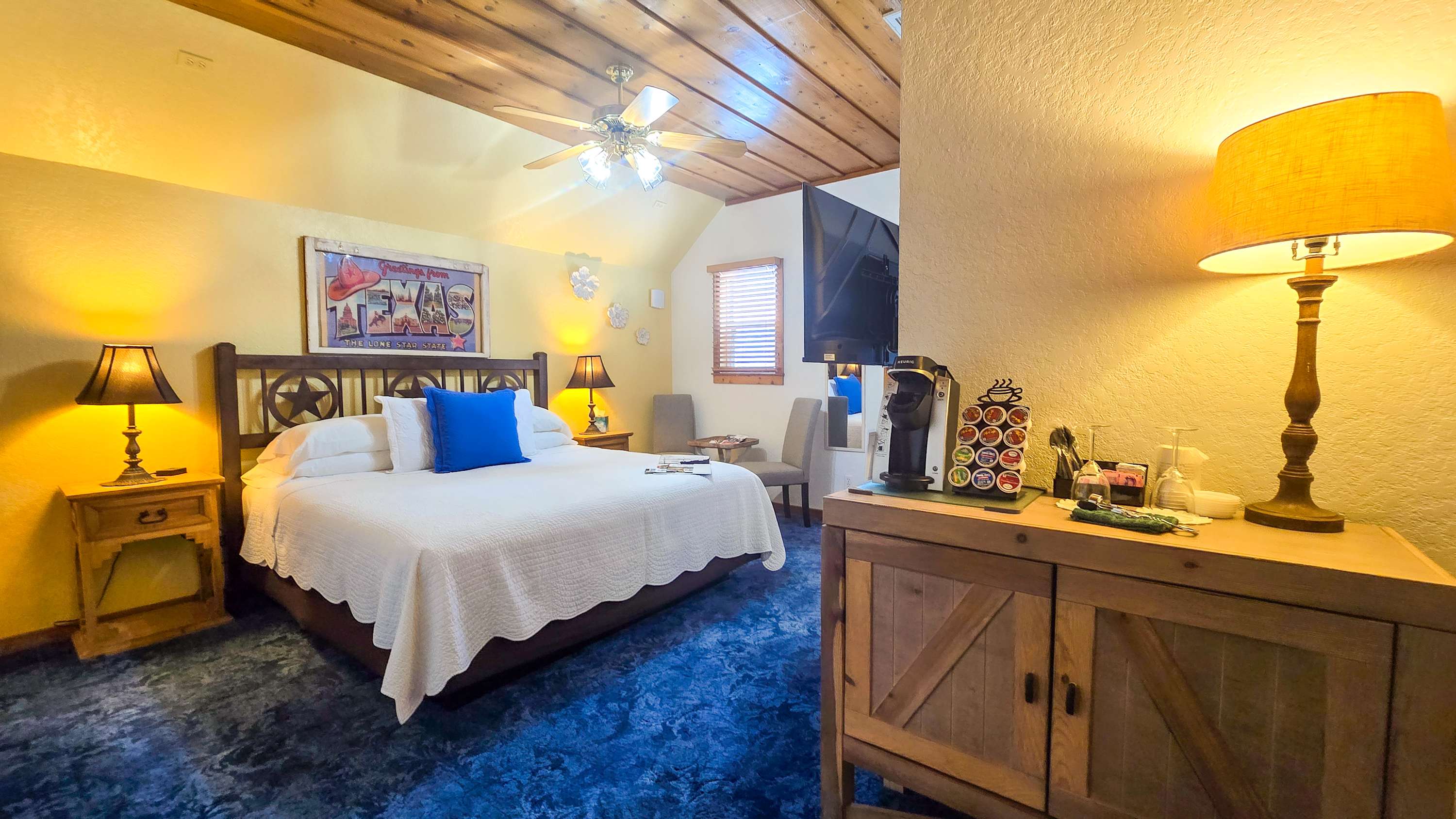 Unwind in the plush king-sized bed & stream your favorites on the smart TV​