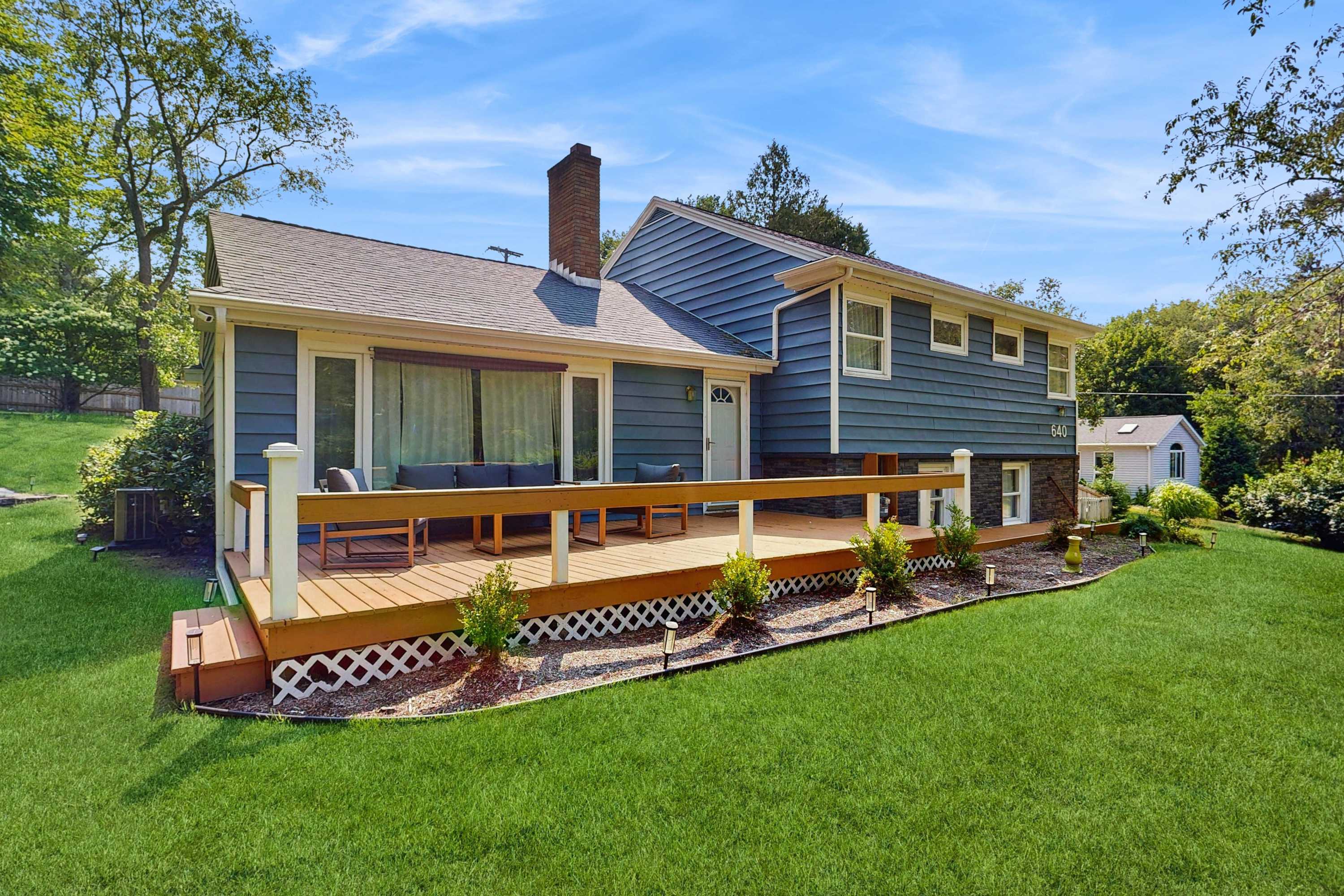 Comfortable home in a great location with enclosed yard, family room, & kayaks