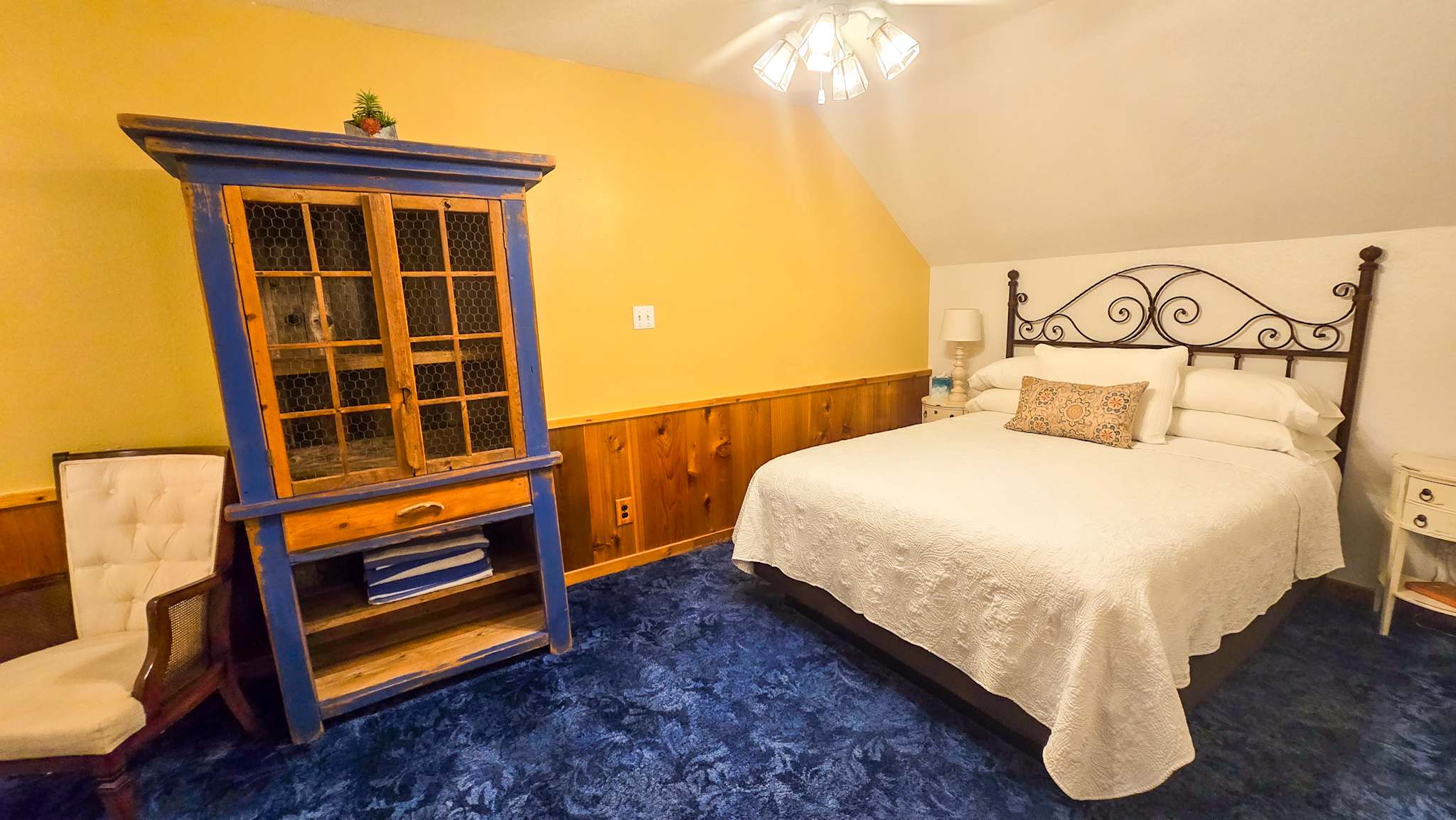 The second bedroom includes a pair of plush queen-sized beds​