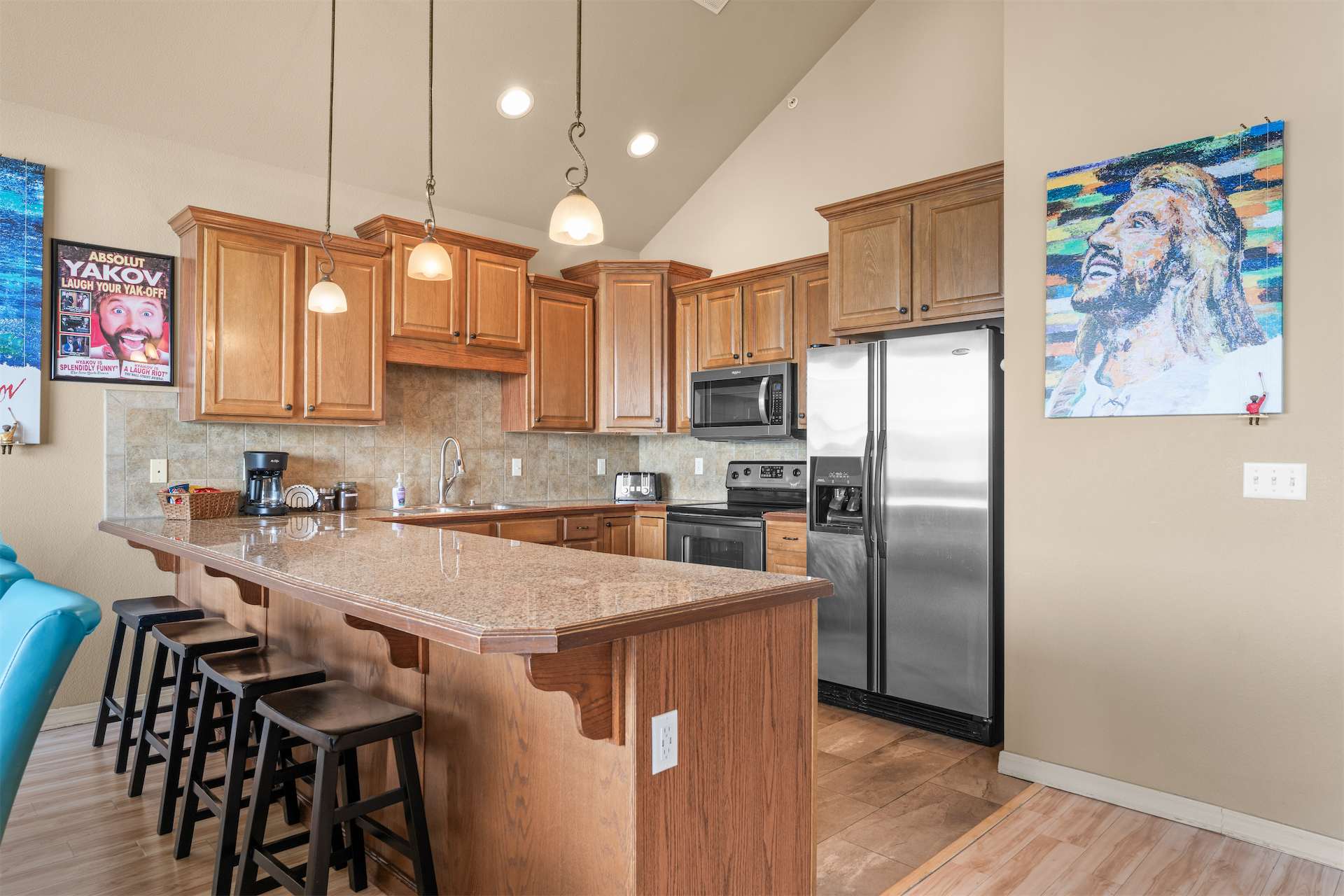 The open kitchen offers ample space & all the comforts of home​