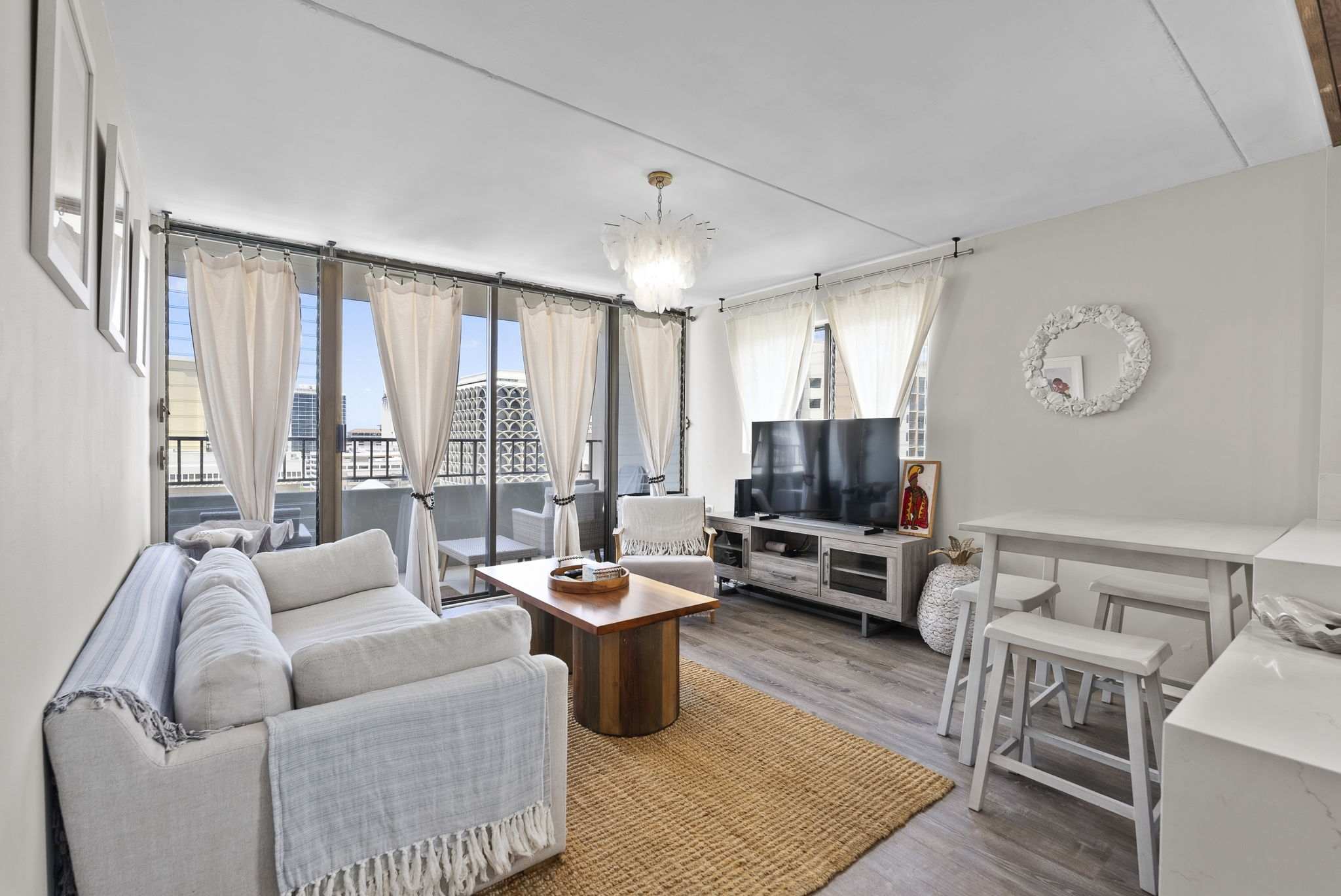 Curl up in the breezy living room & enjoy a movie night at home​