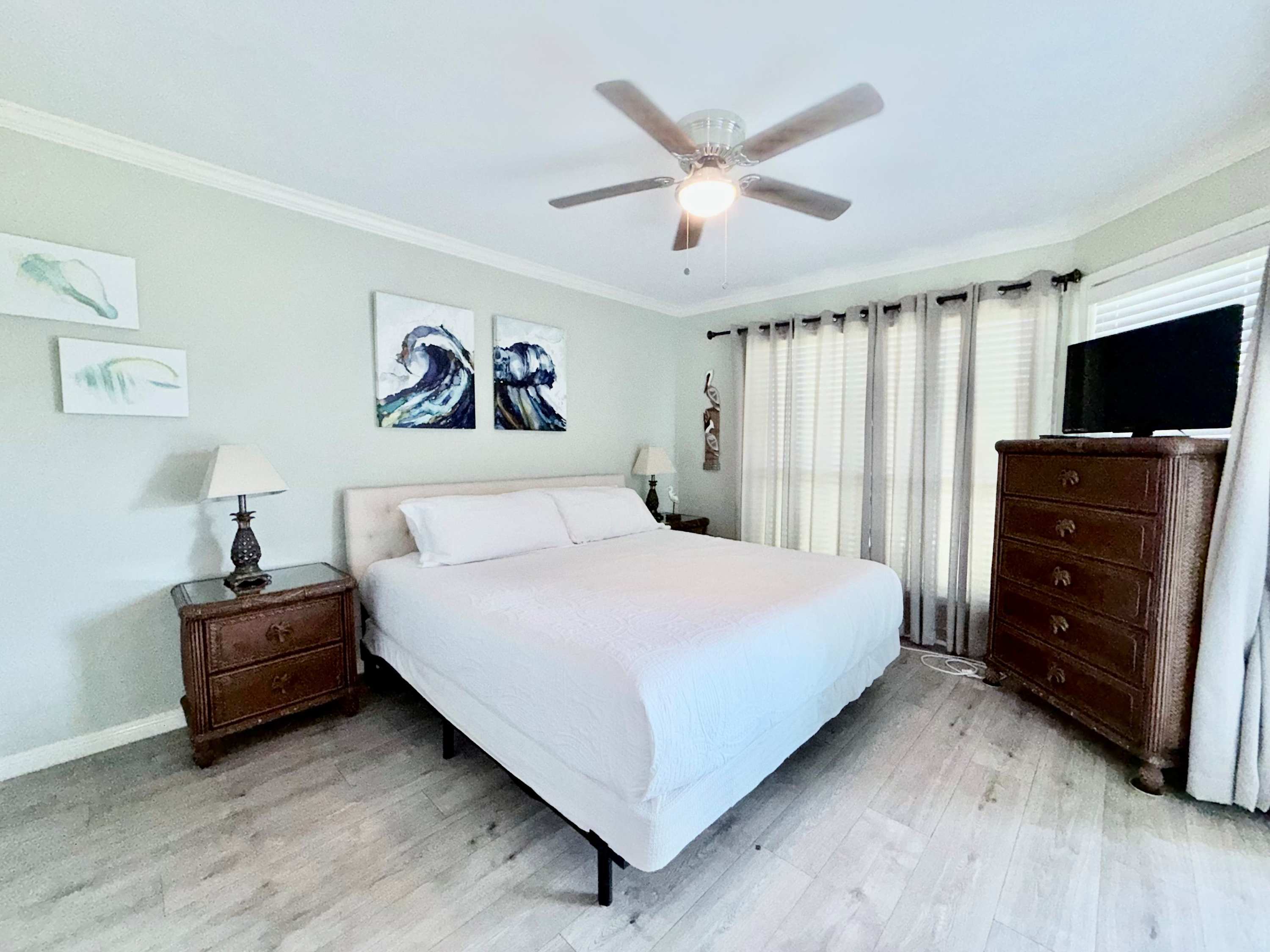 King bedroom with an on-suite bathroom and patio.