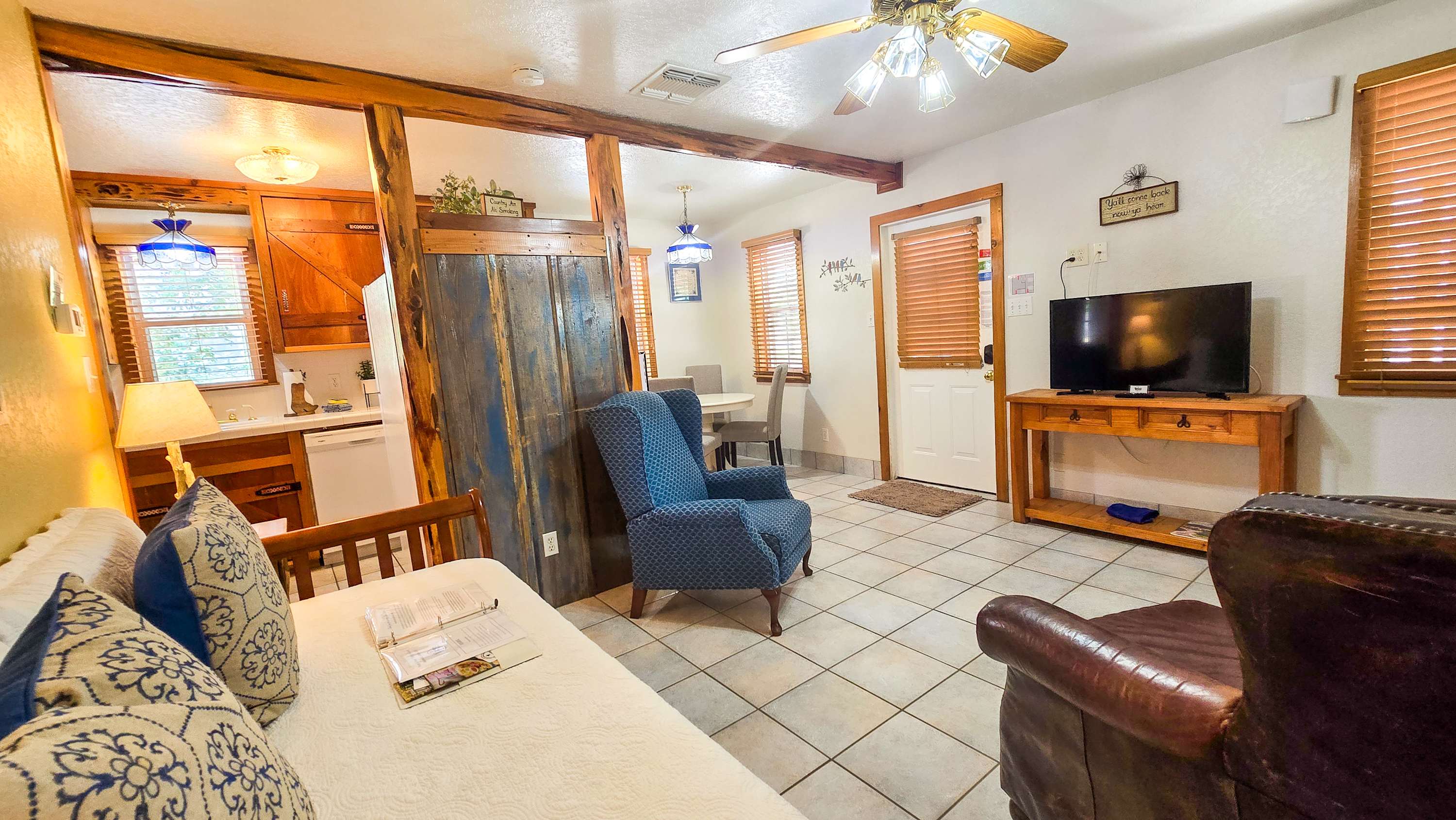 Recharge in Shiner Suite’s charming living room area & enjoy a movie night at home​