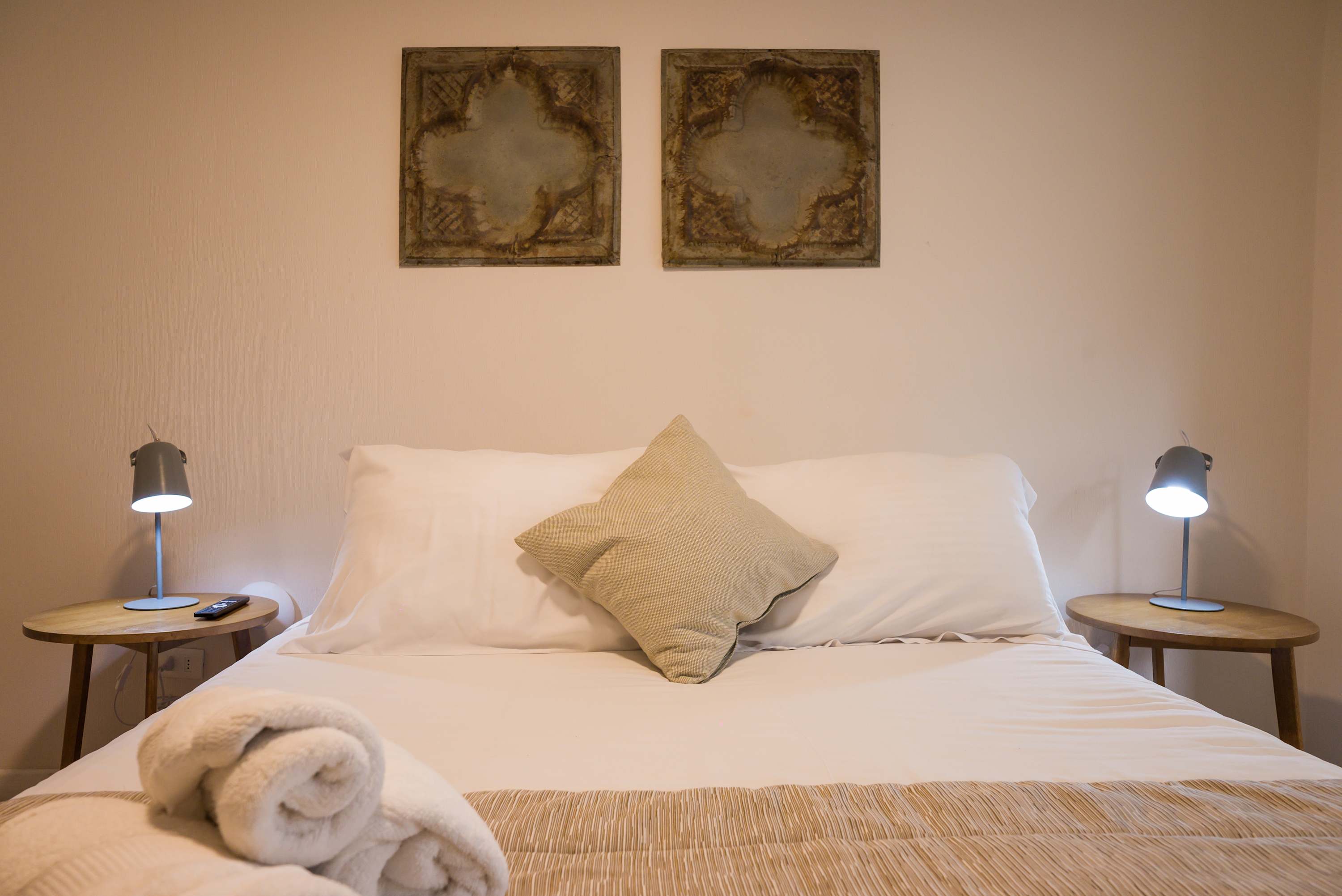 Relax in this cozy studio with a comfortable bed and stylish decor, perfect for a restful stay.