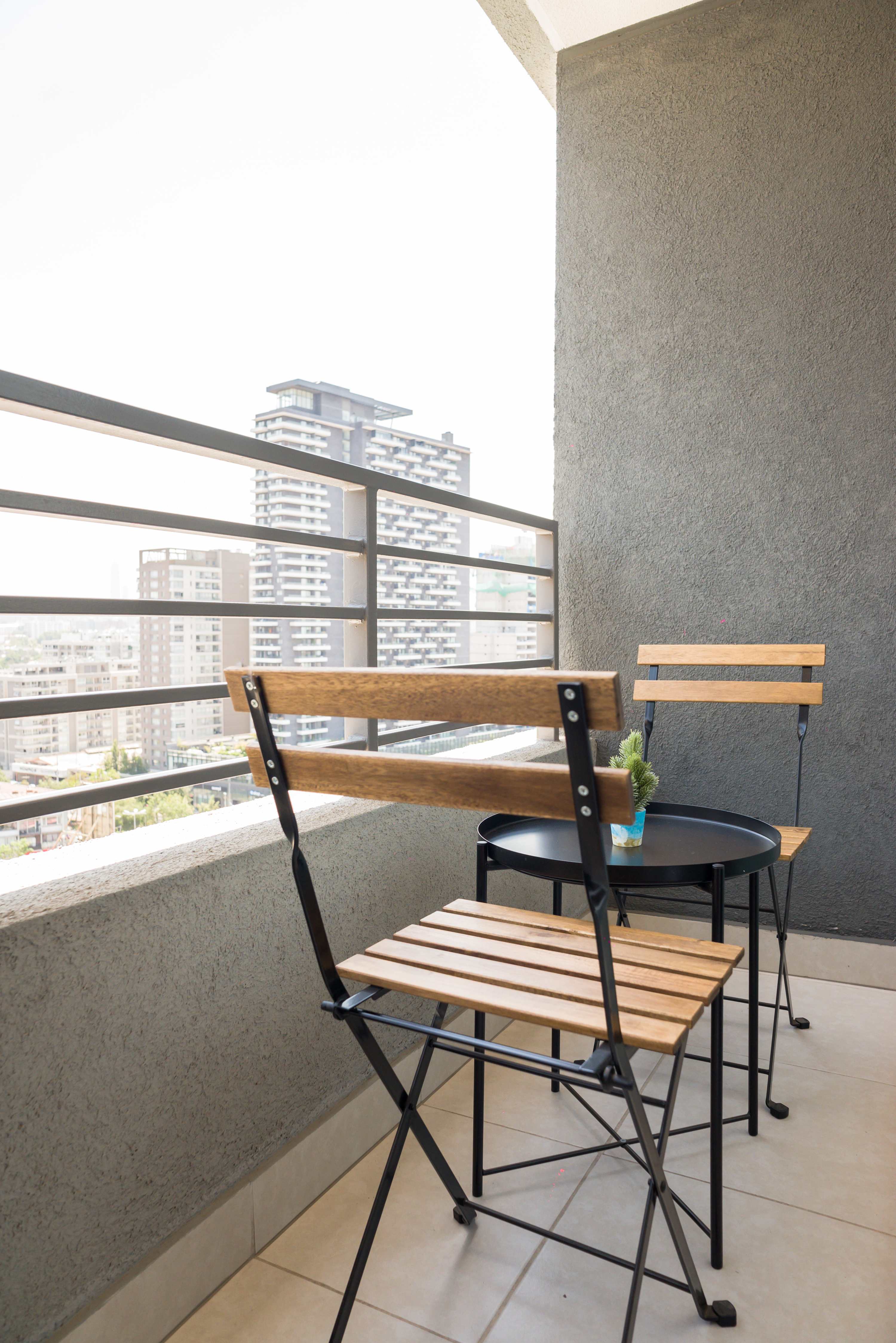 Enjoy a morning coffee with stunning city views from your private balcony.