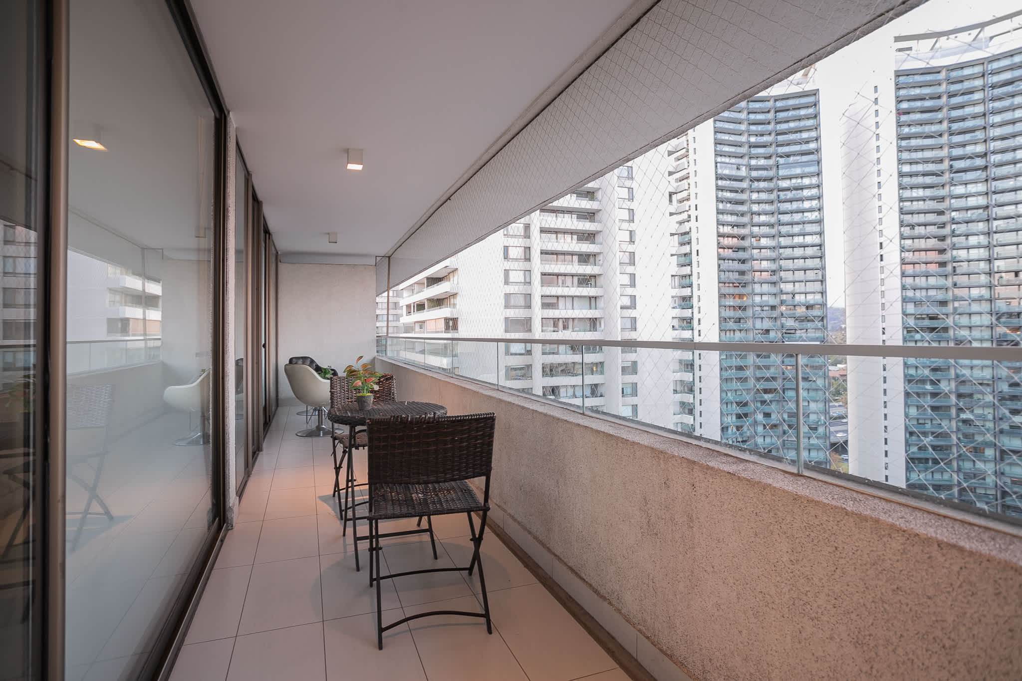 Relax on the private balcony with stunning city views, perfect for enjoying a morning coffee or evening drink.