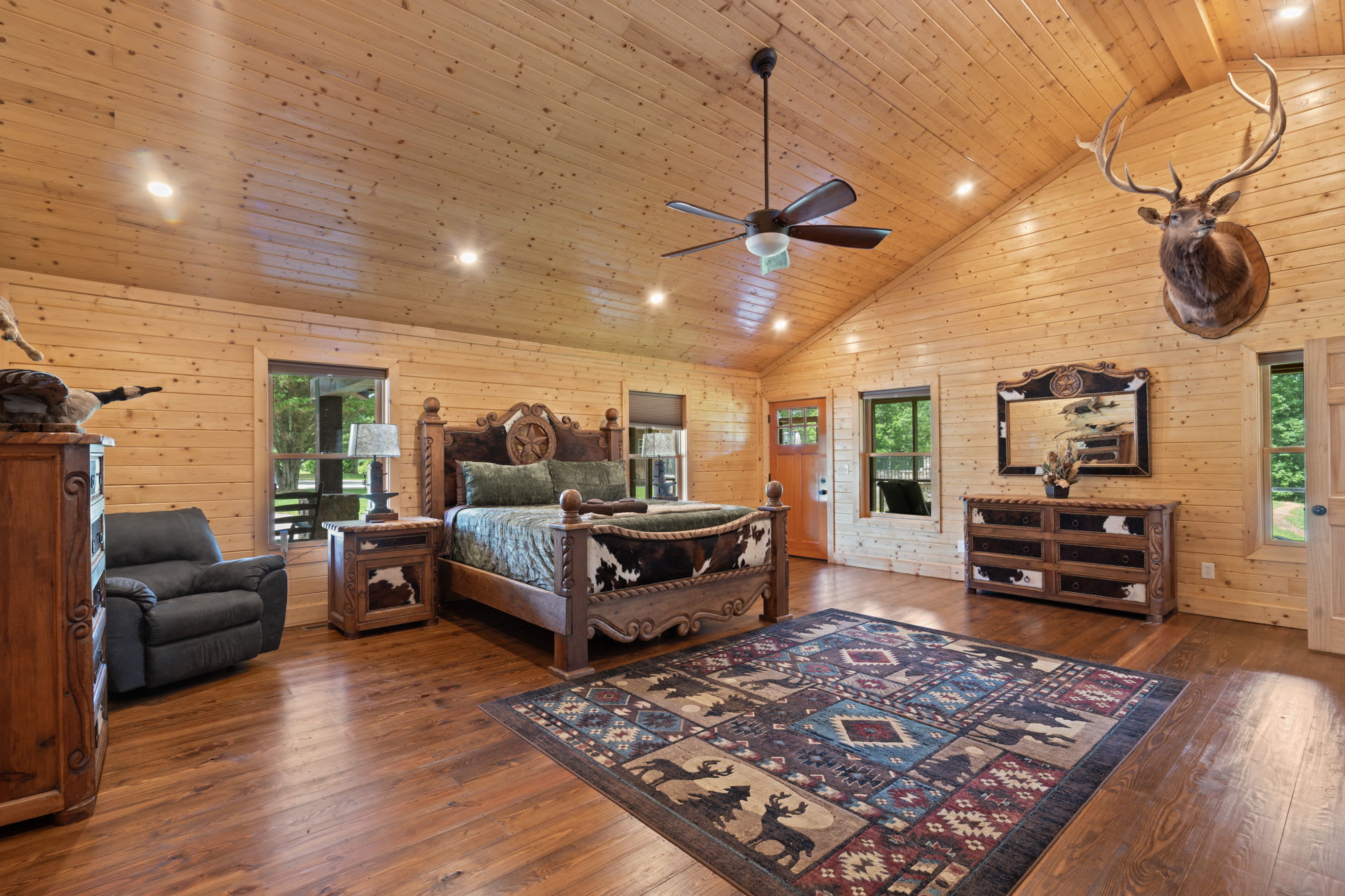 Main floor primary bedroom at The Lodge