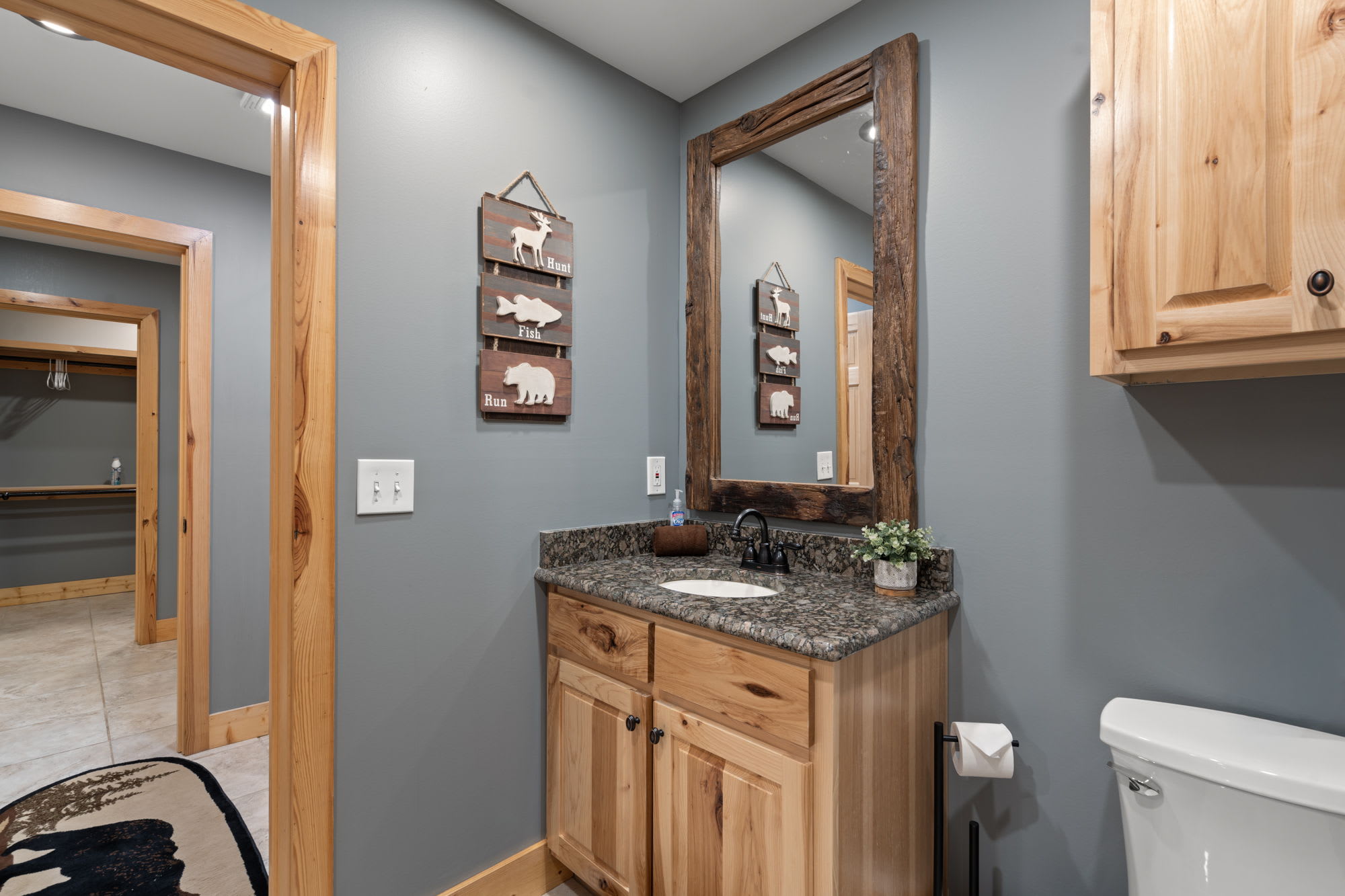 Private half bath for the second guest bedroom. This has a jack & Jill bathroom layout with a shared shower with the first guest bedroom