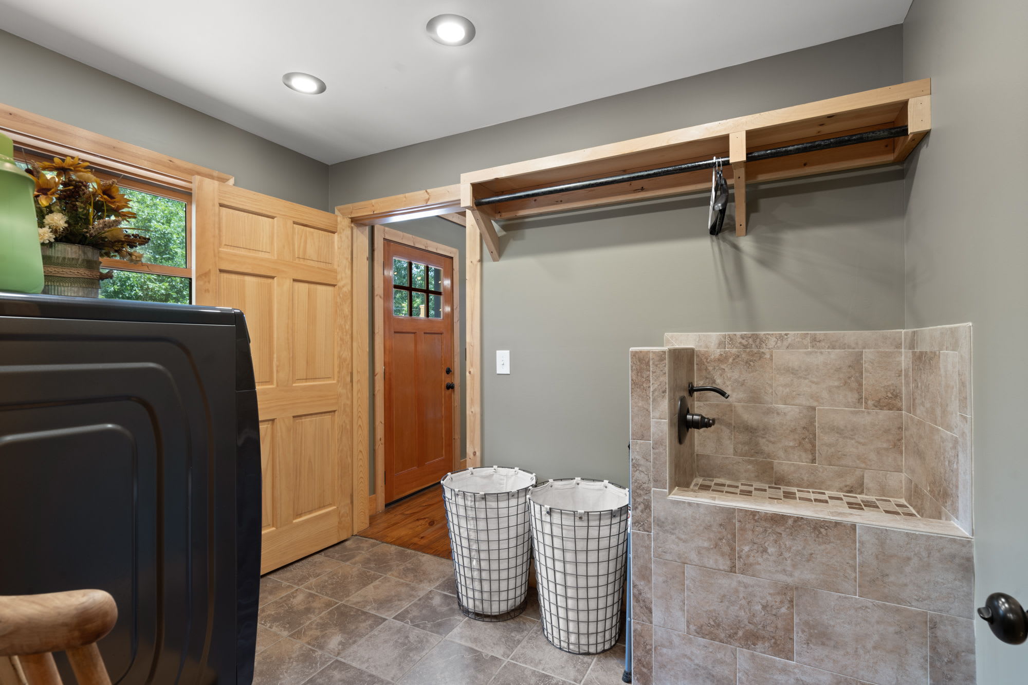 Laundry room with pet washing station