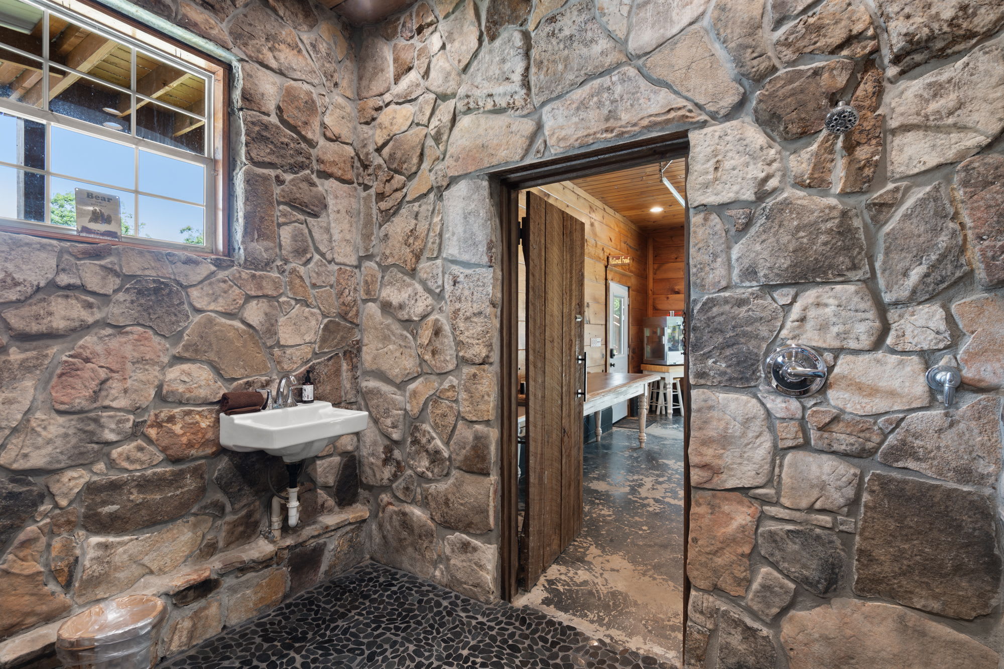 Full bathroom off the entrance which is perfect after a day of swimming!