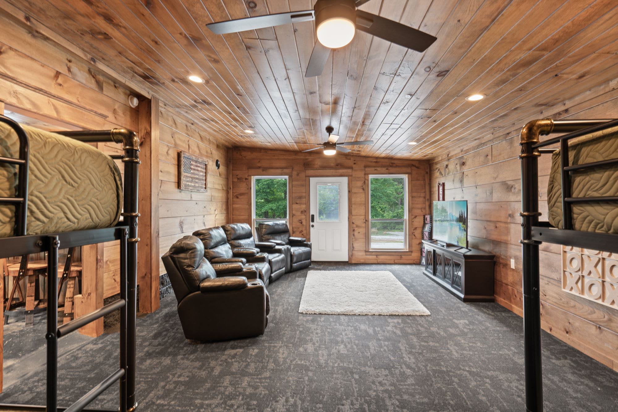 Bunk house downstairs bedroom & media room