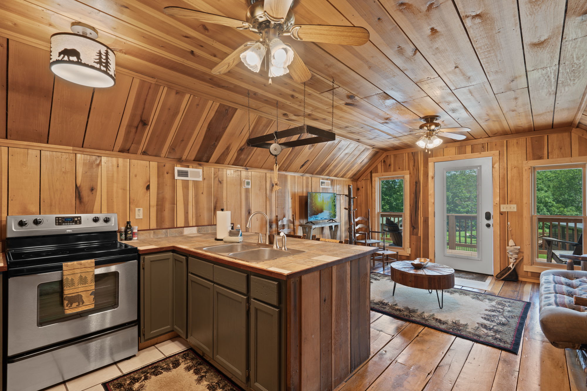 Bunk house upstairs living room, kitchen, & bar