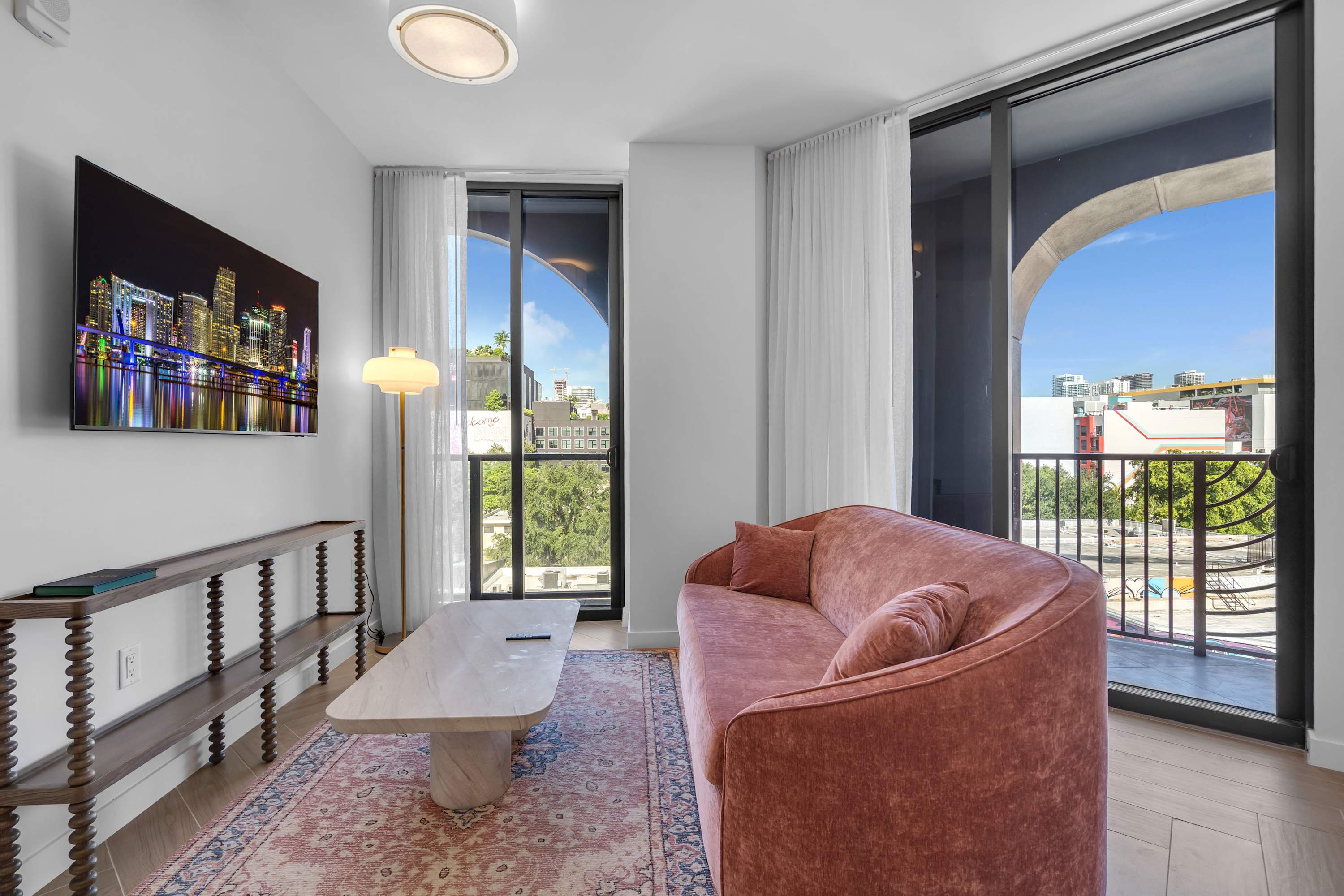 Curl up in the airy living room & stream your favorites on the smart TV​